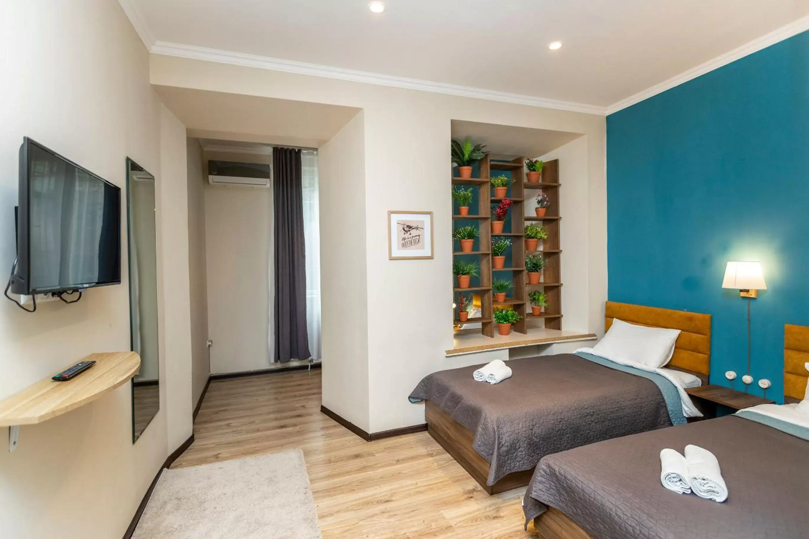 Standard Triple Room in Hotello Standard Triple Room in Hotello