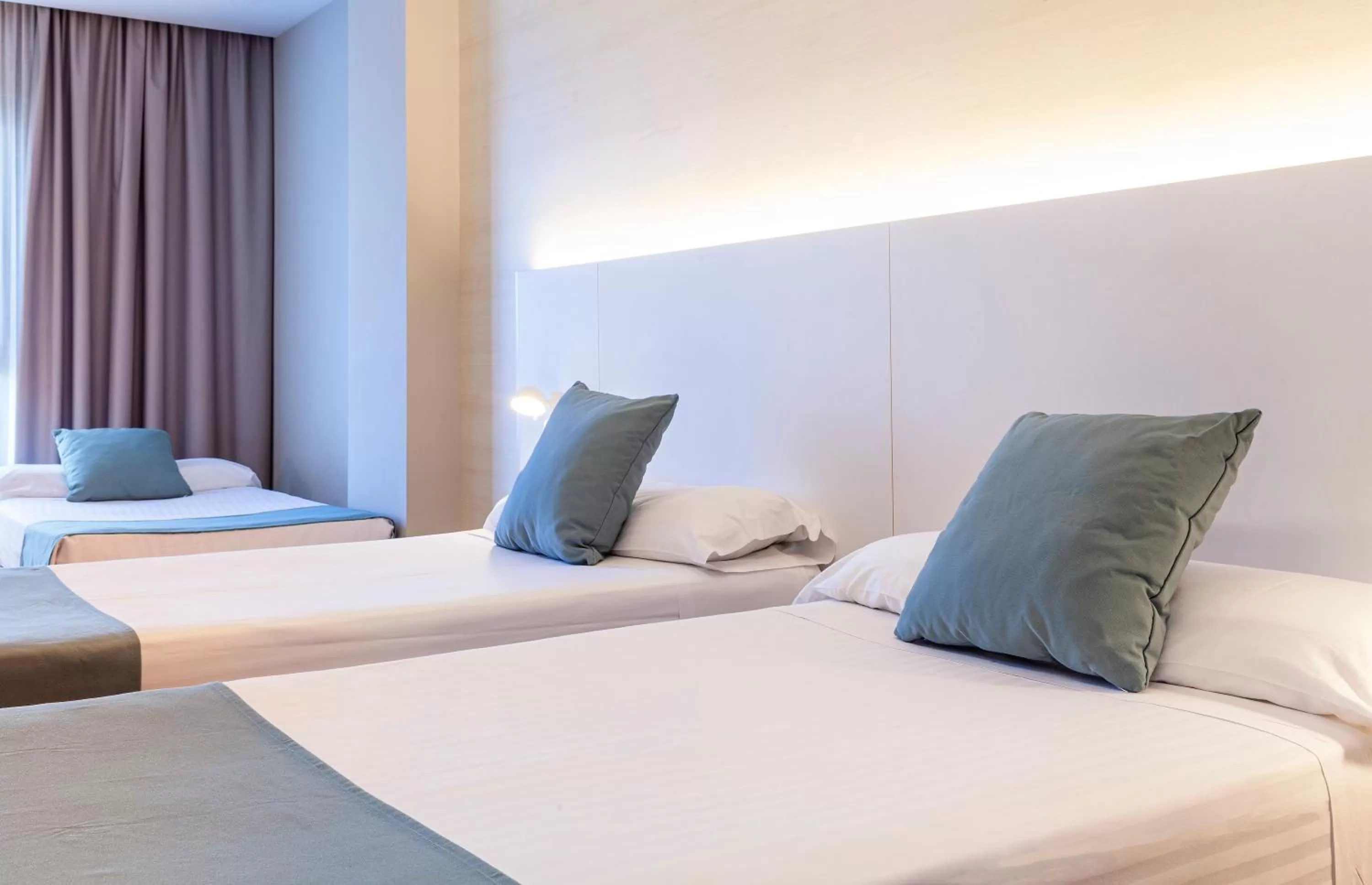 Decorative detail, Bed in Hotel Olympia Valencia