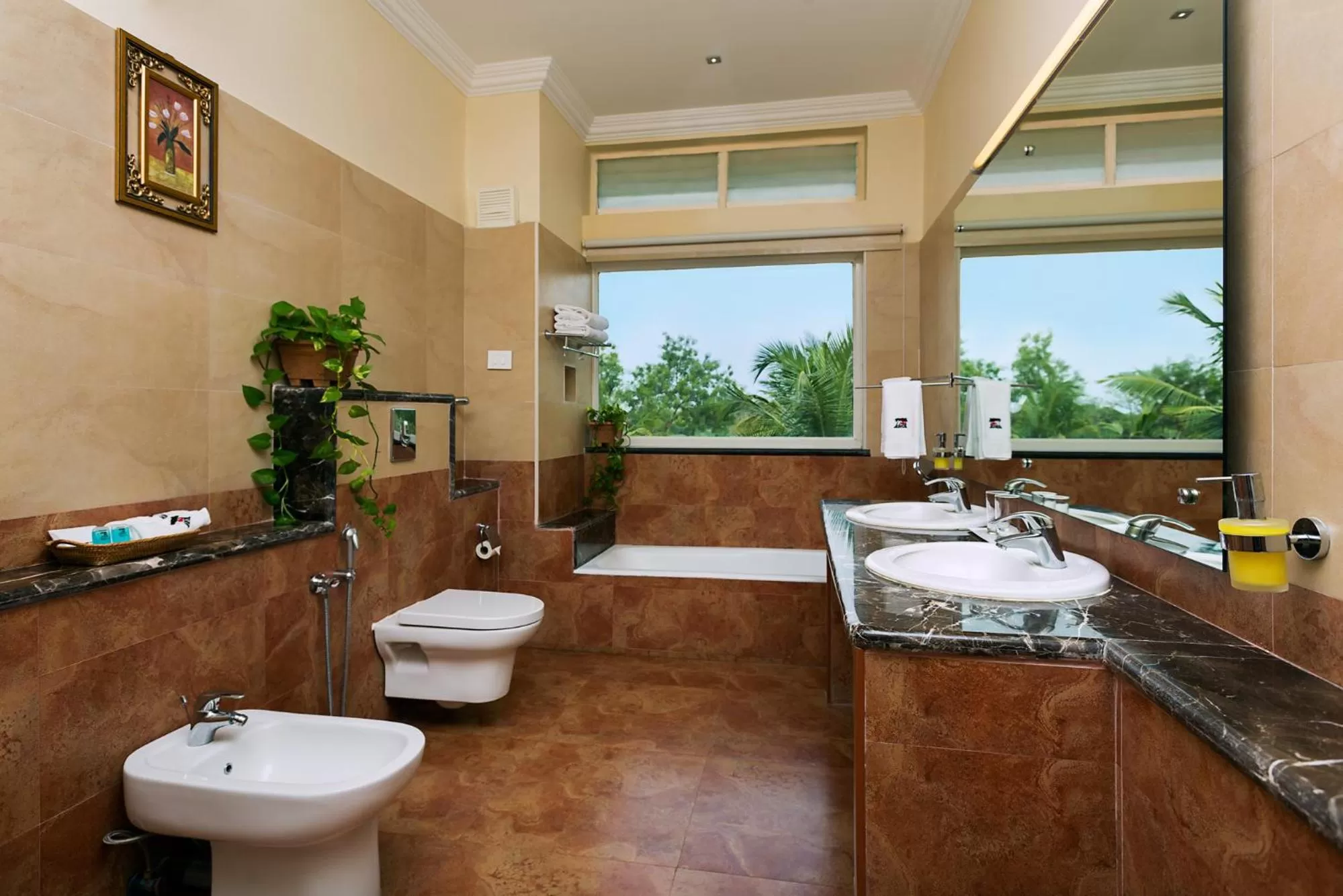 Shower in GReaT Trails Riverview Thanjavur By GRT Hotels