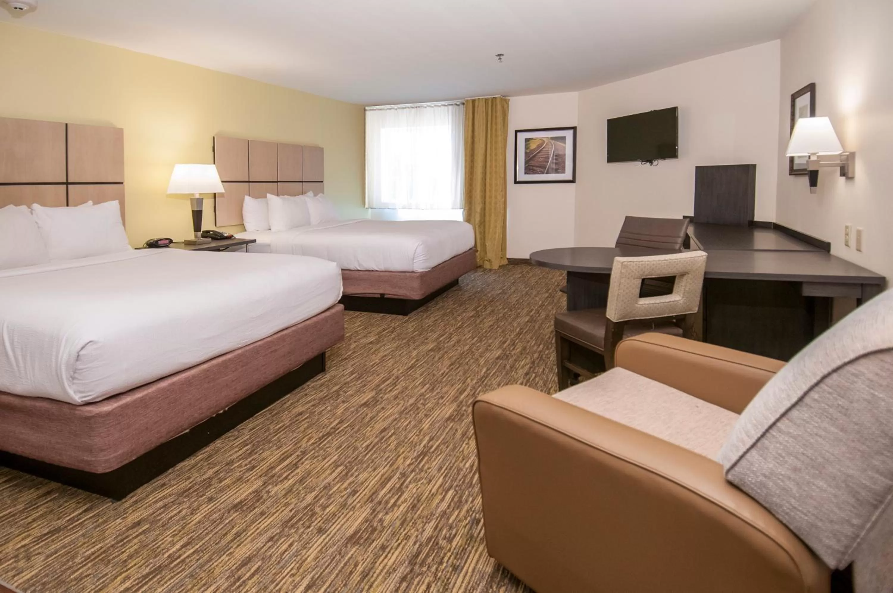 Photo of the whole room, Bed in Candlewood Suites - Baton Rouge - College Drive by IHG