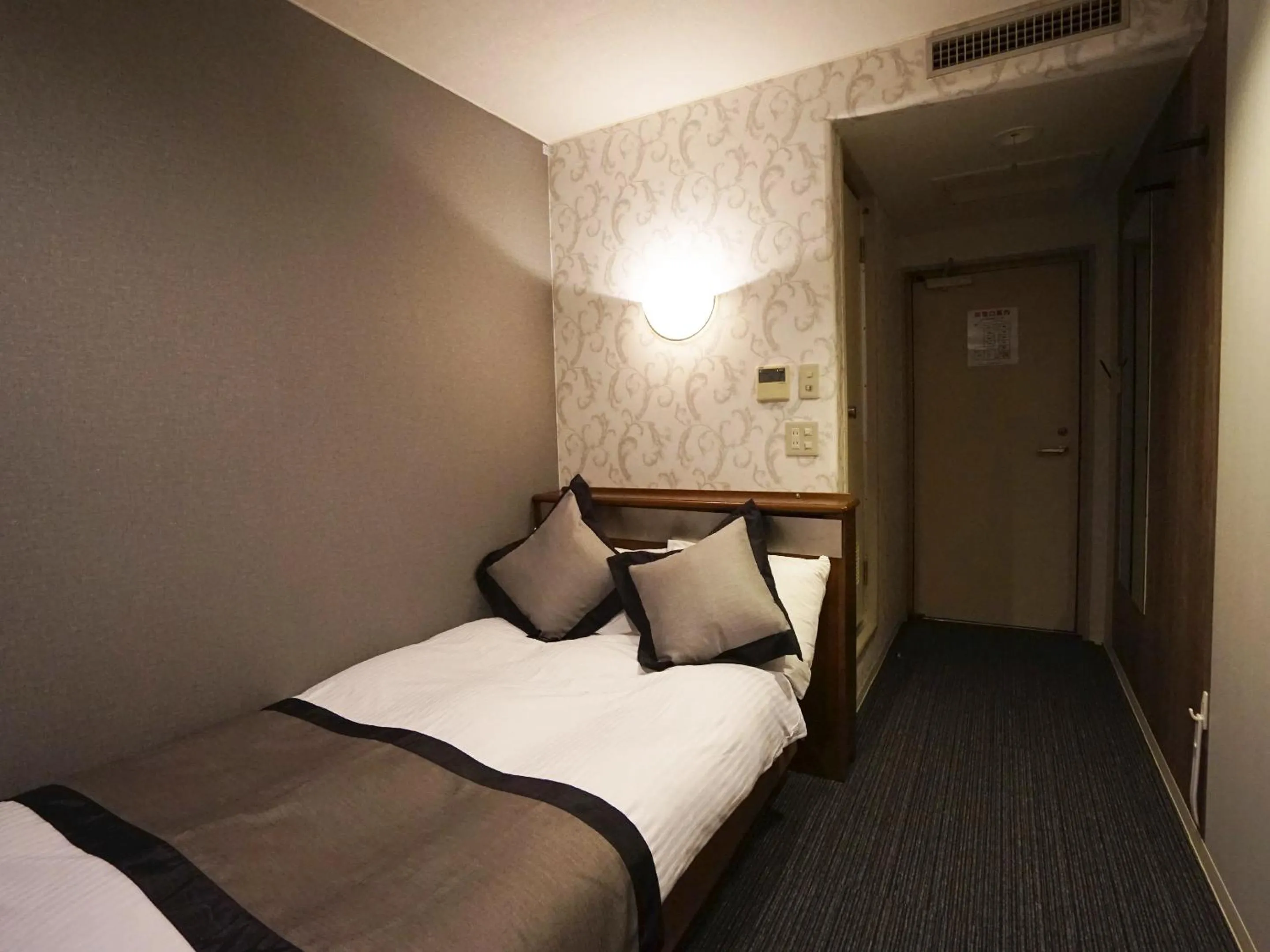 Photo of the whole room, Bed in Hotel Areaone Kochi