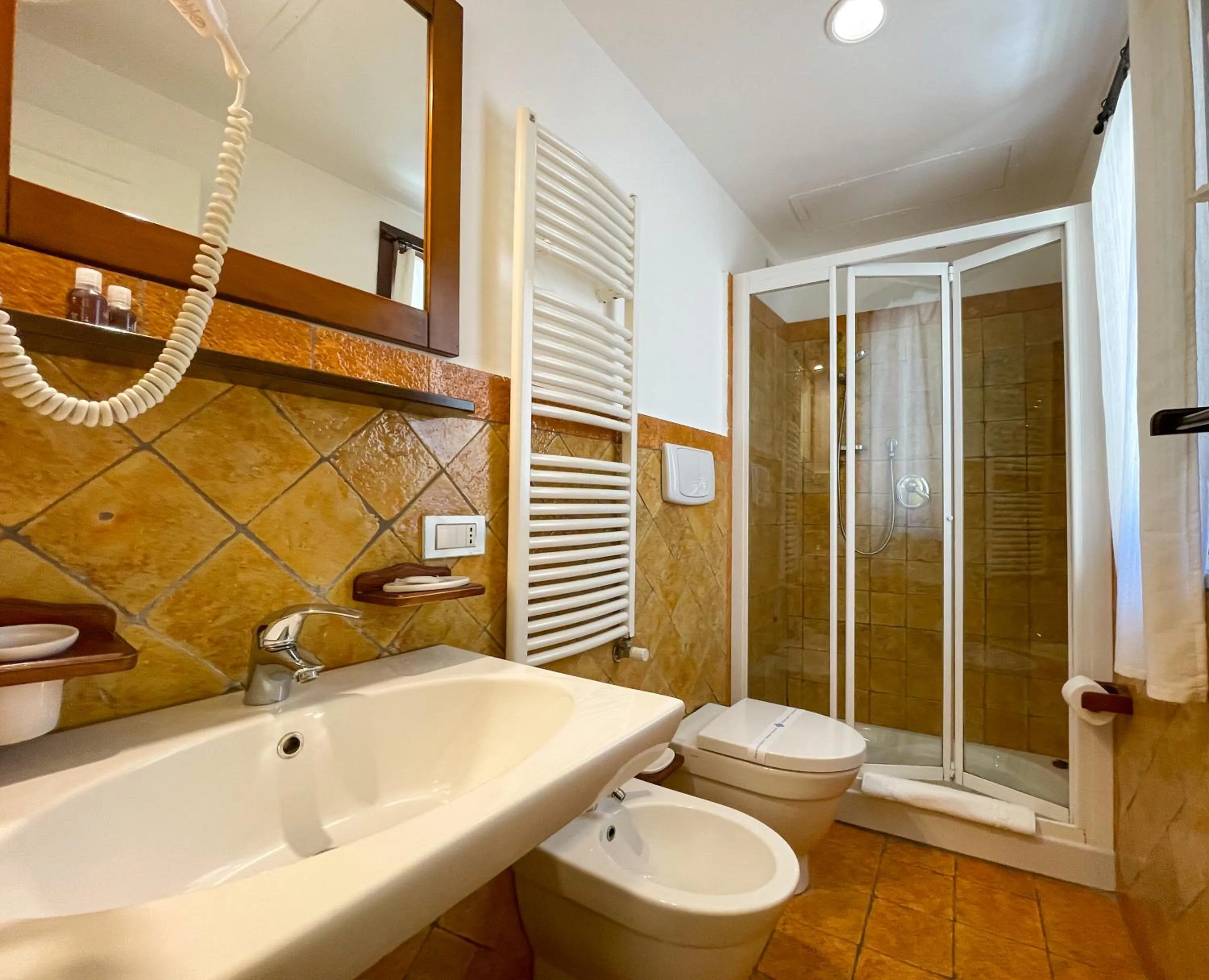 Bed in Hotel La Plumeria