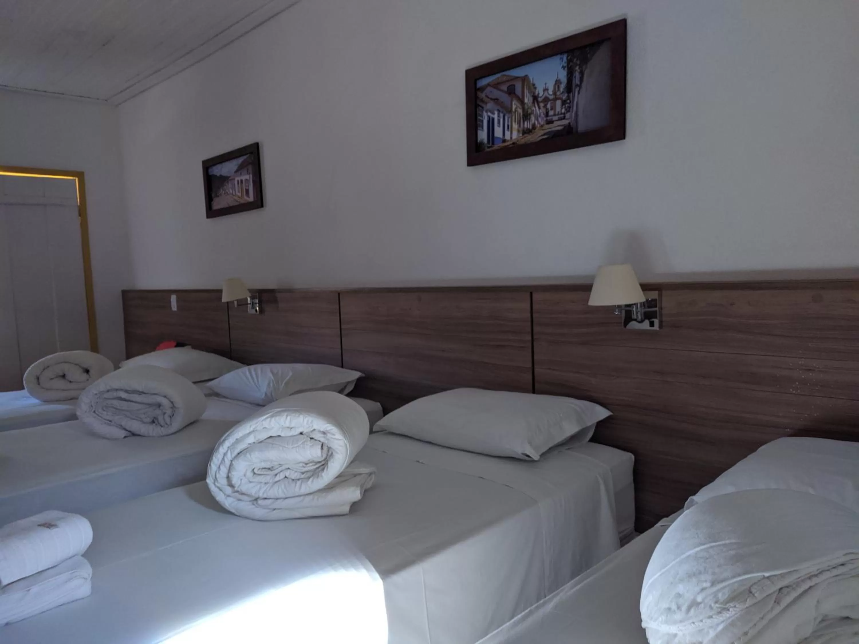 Bed in Pousada o Amanhecer