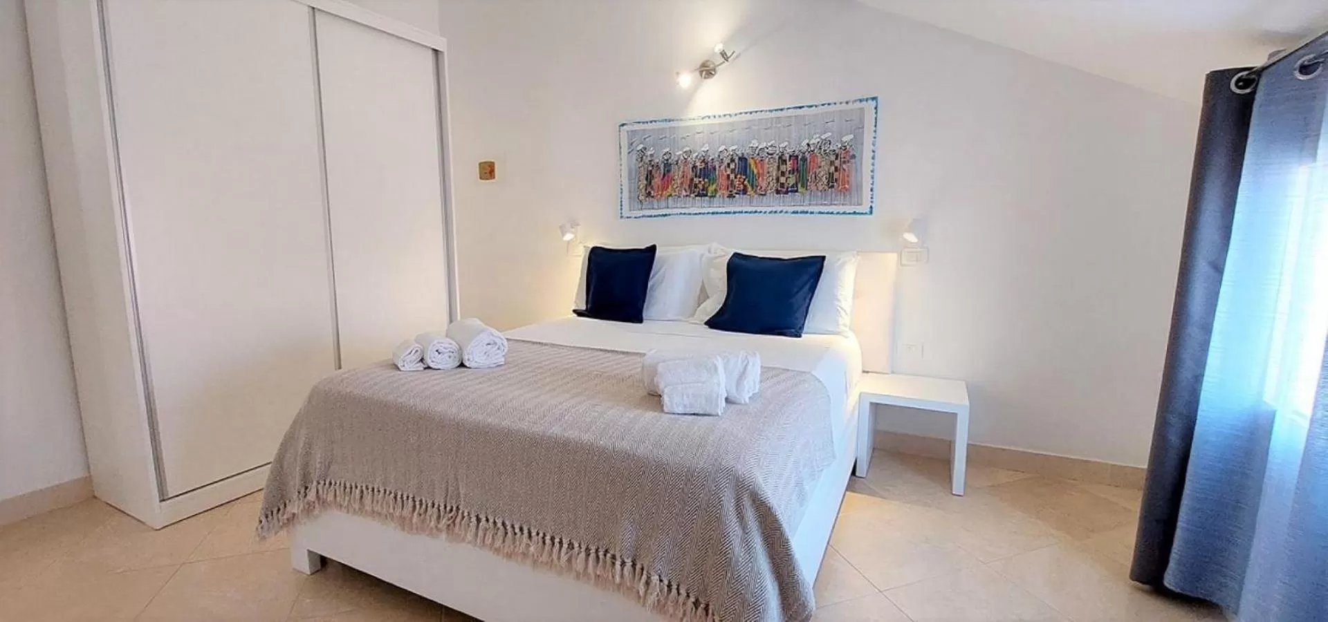Bed in Branco Suites - Rooms & Holiday Apartments