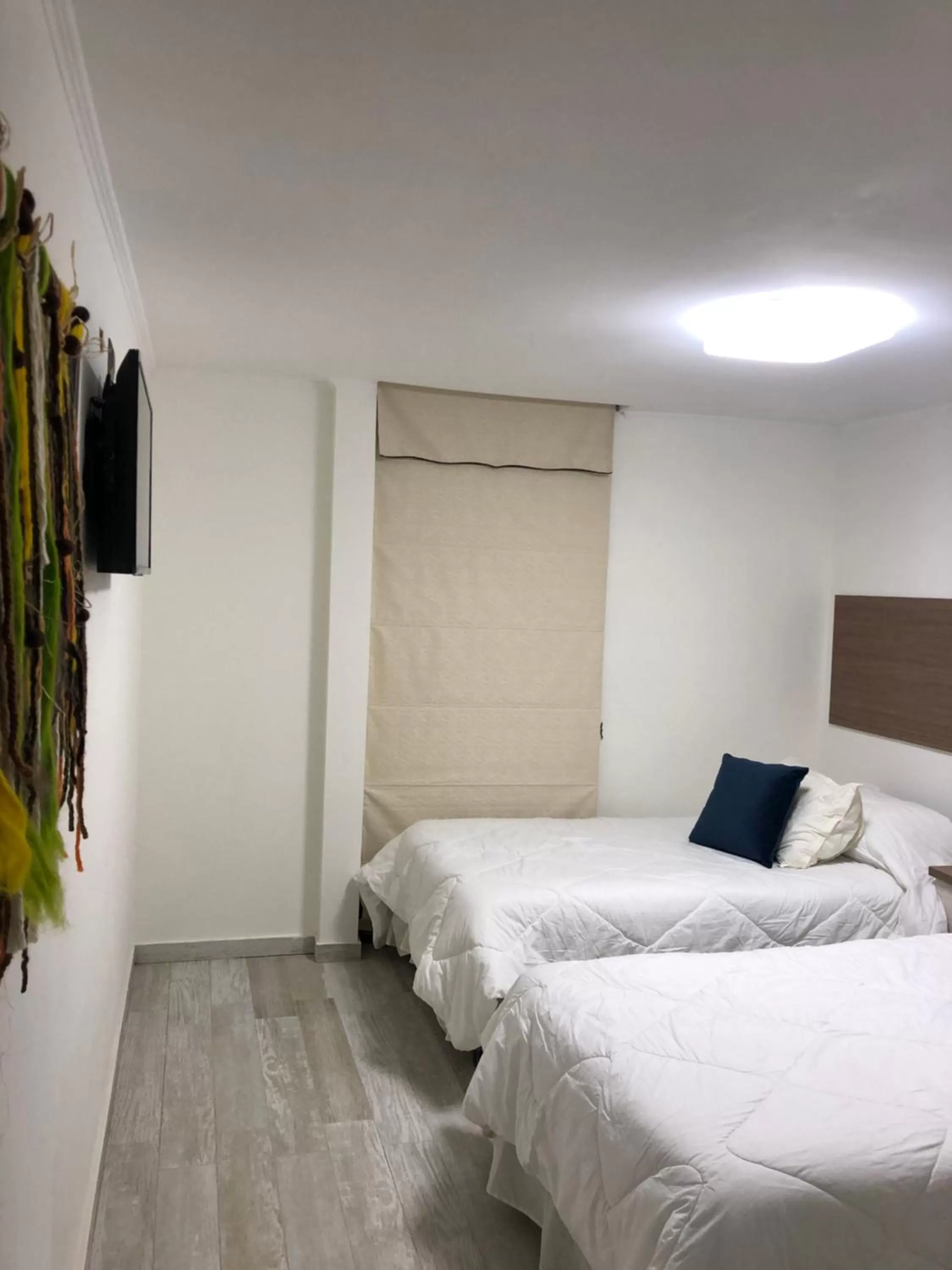 Bed in Hotel Boutique Suri