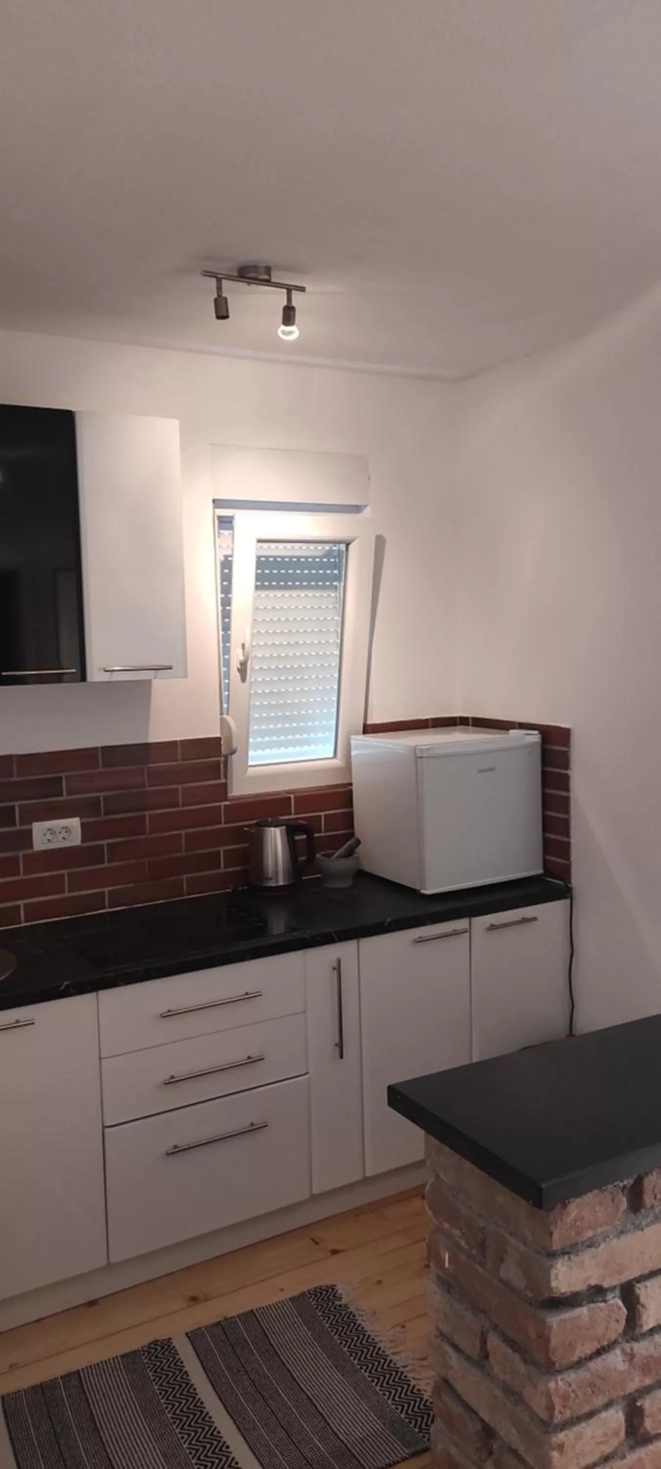 Kitchen/Kitchenette in Hotel & Rooms Lombrelle