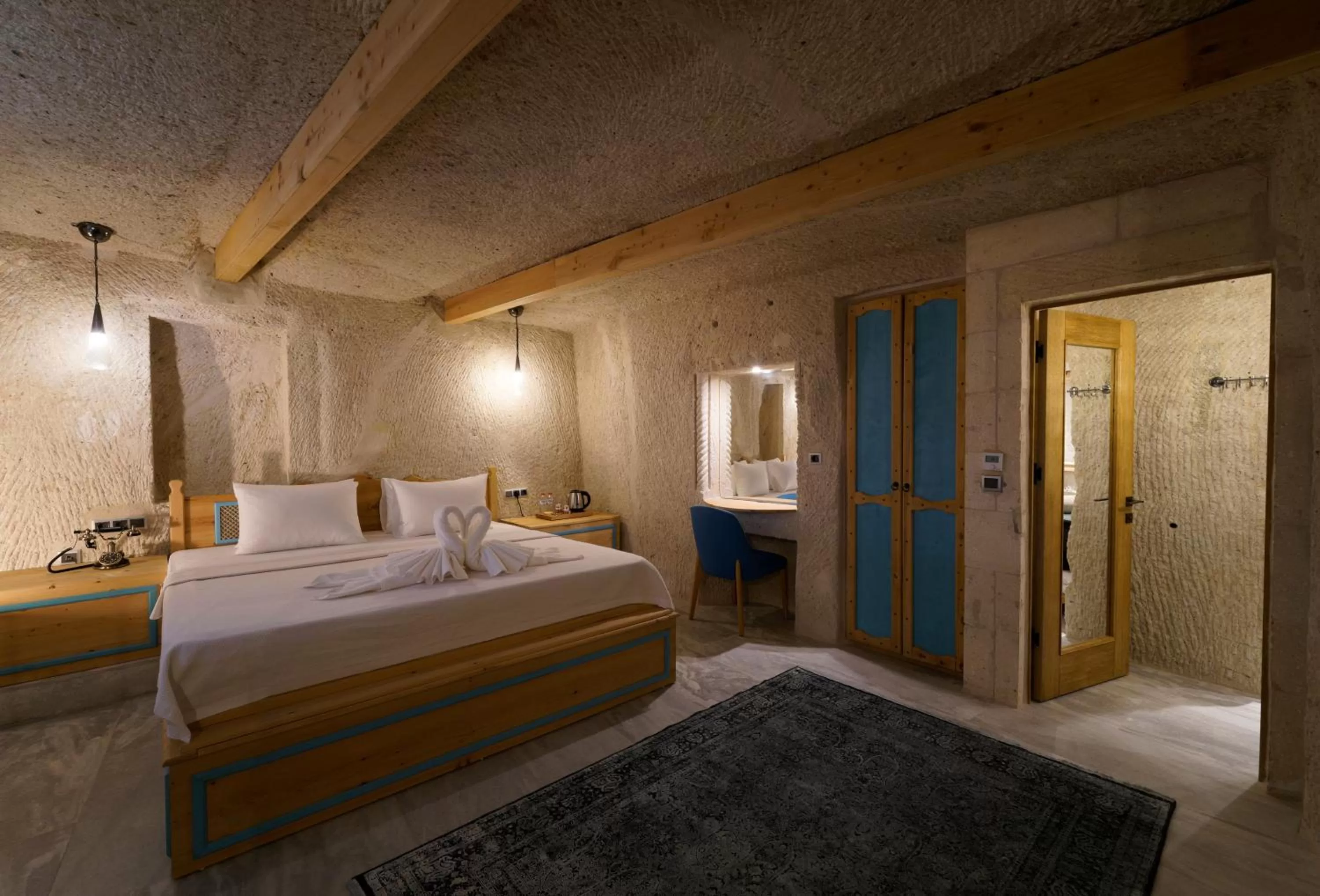 Bed in The Niche Cave Hotel