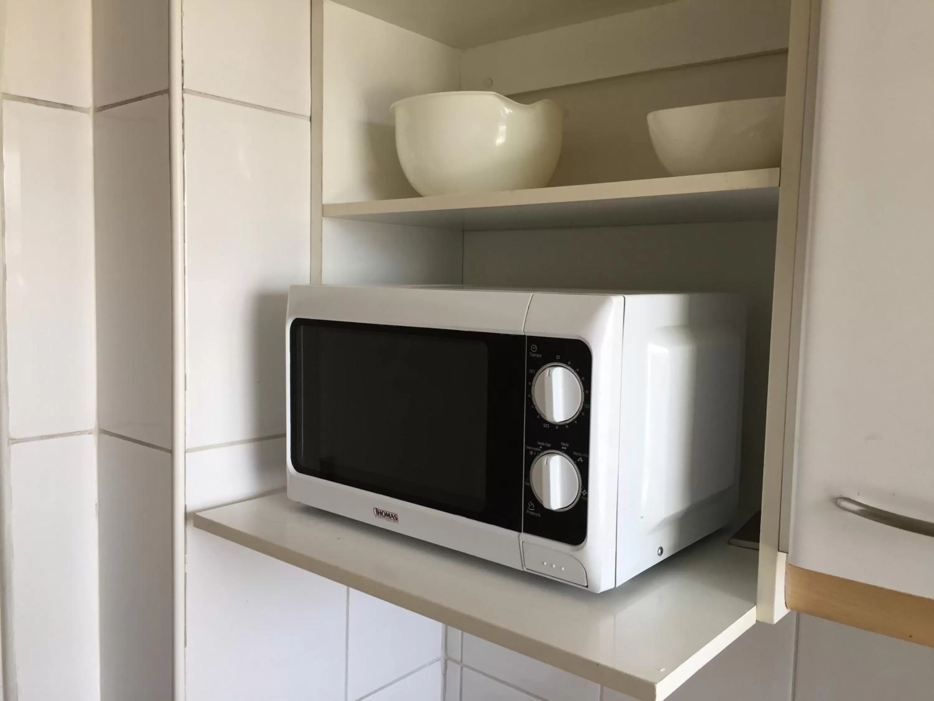 Kitchen or kitchenette, TV/Entertainment Center in Aconcagua Apartments