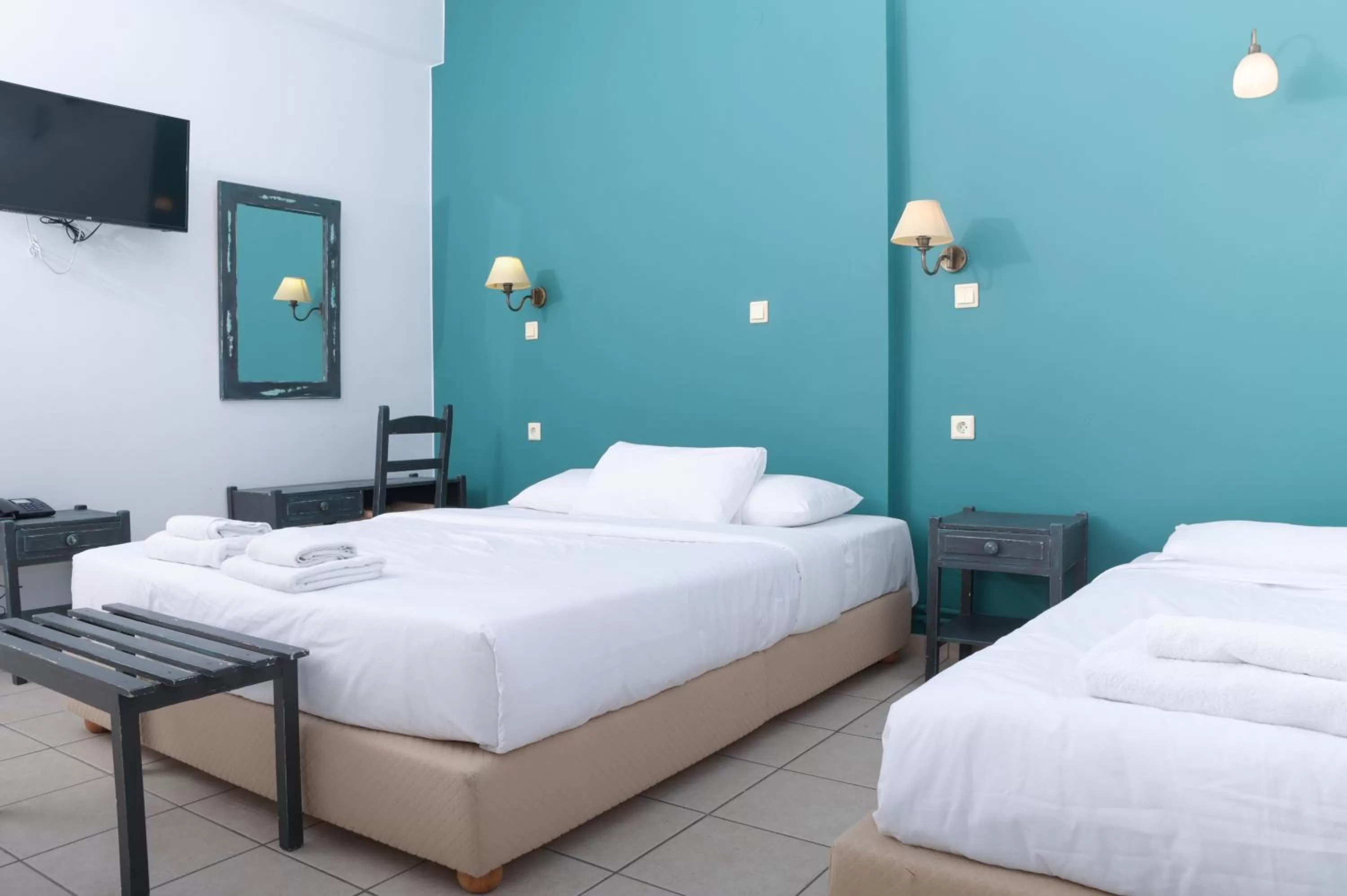 Bed in Ikaros Art Hotel