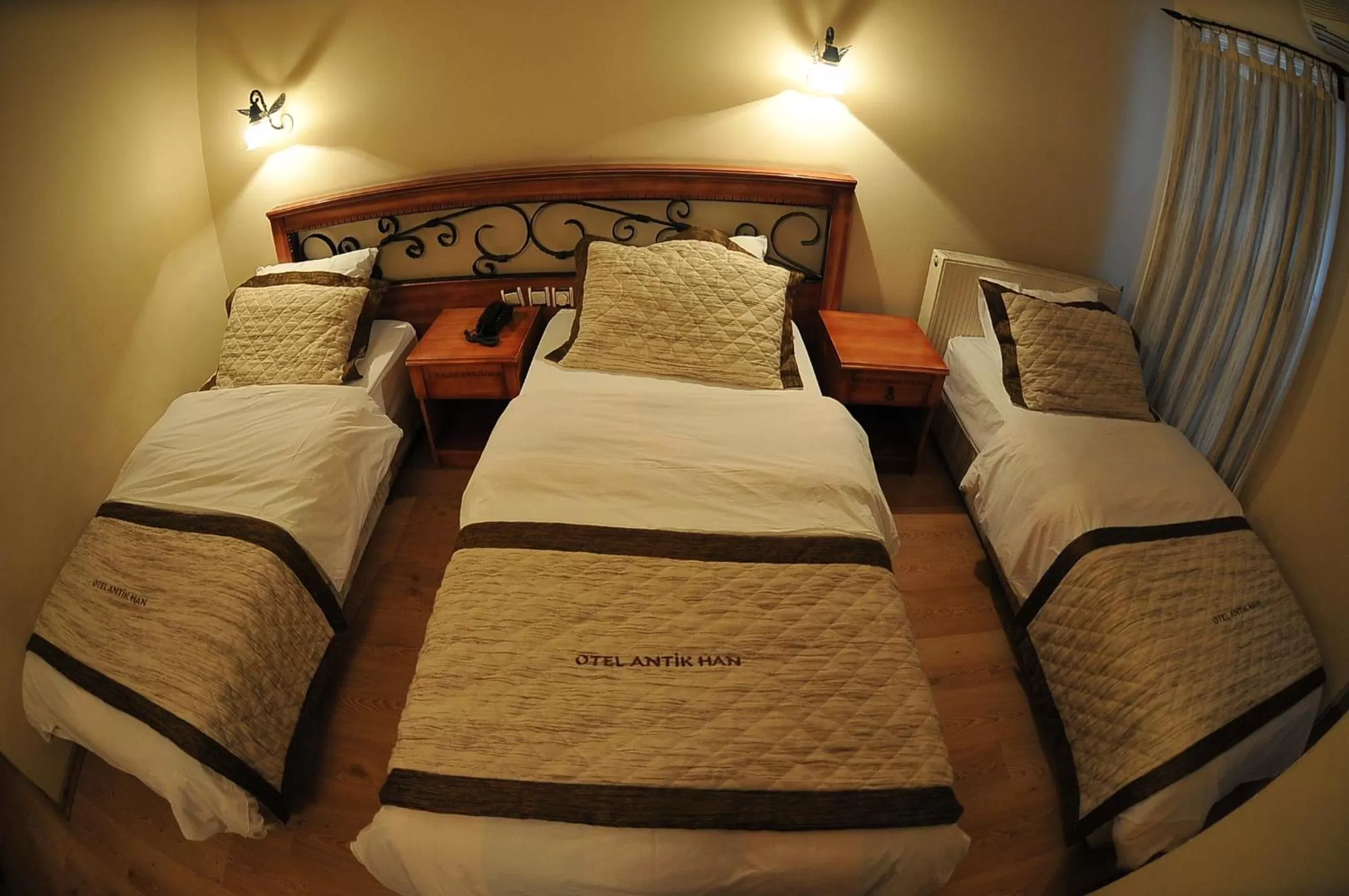 Bed in Antikhan Hotel