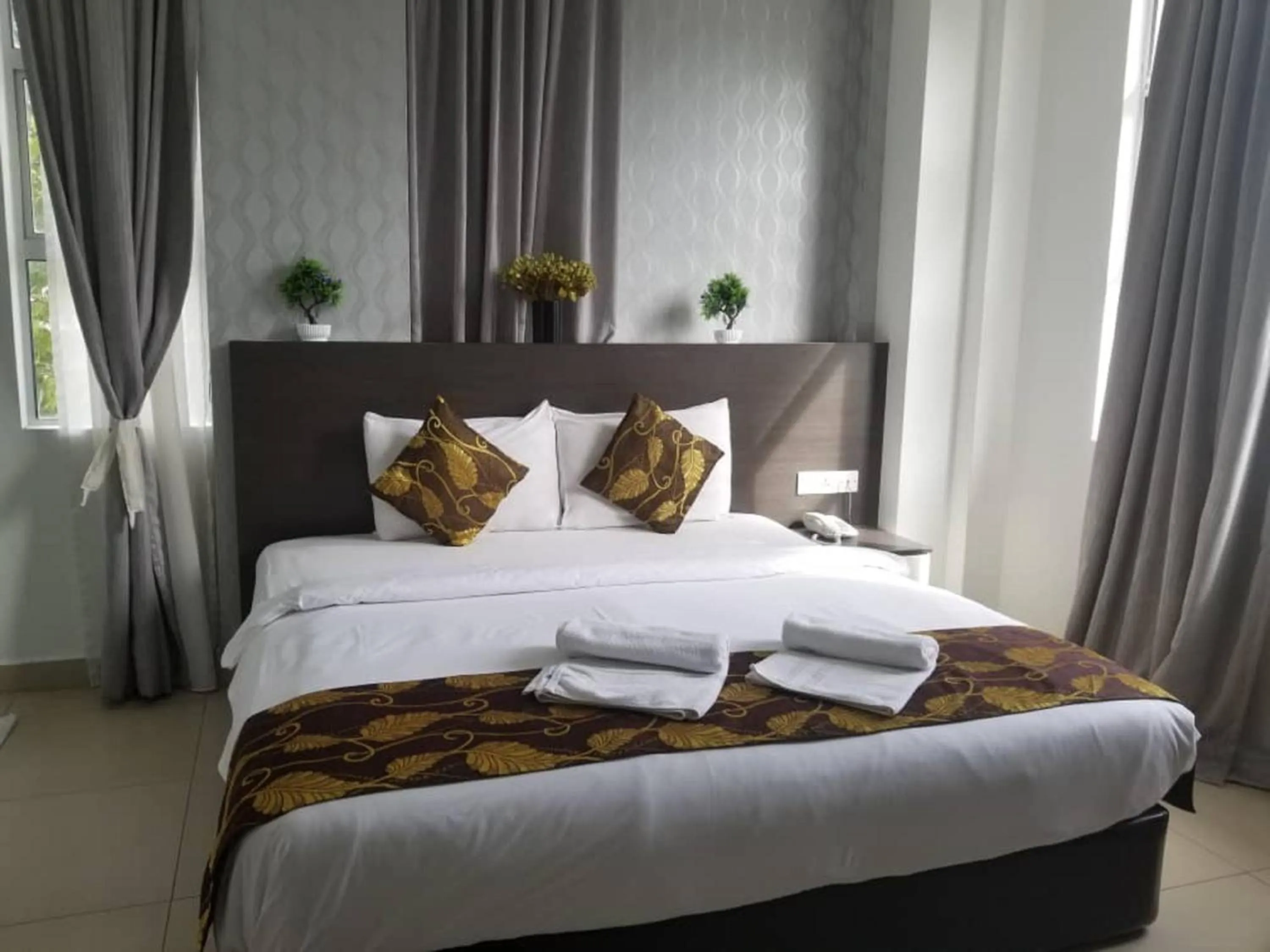 Photo of the whole room, Bed in D'Metro Hotel