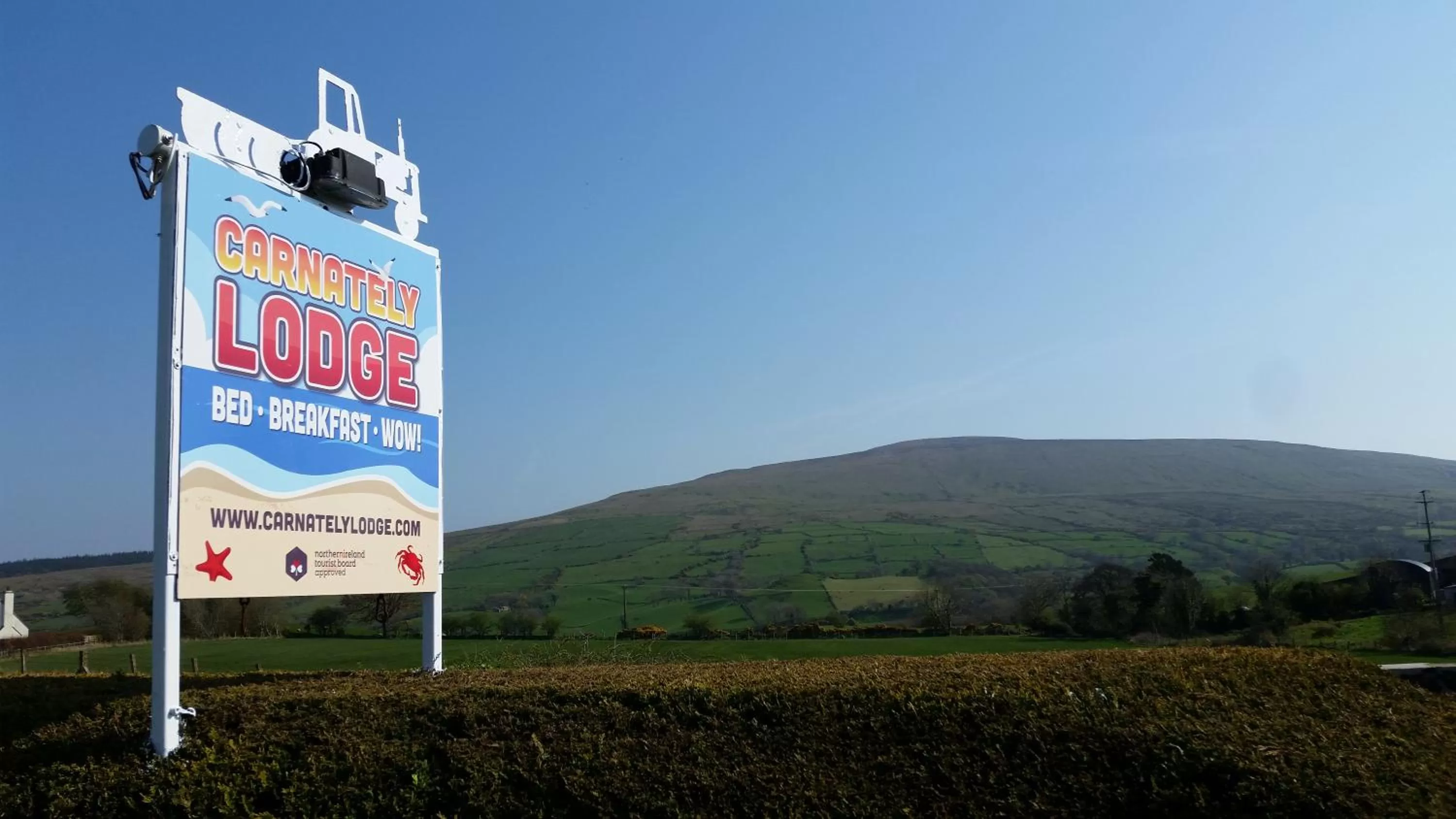 Property logo or sign in Carnately Lodge