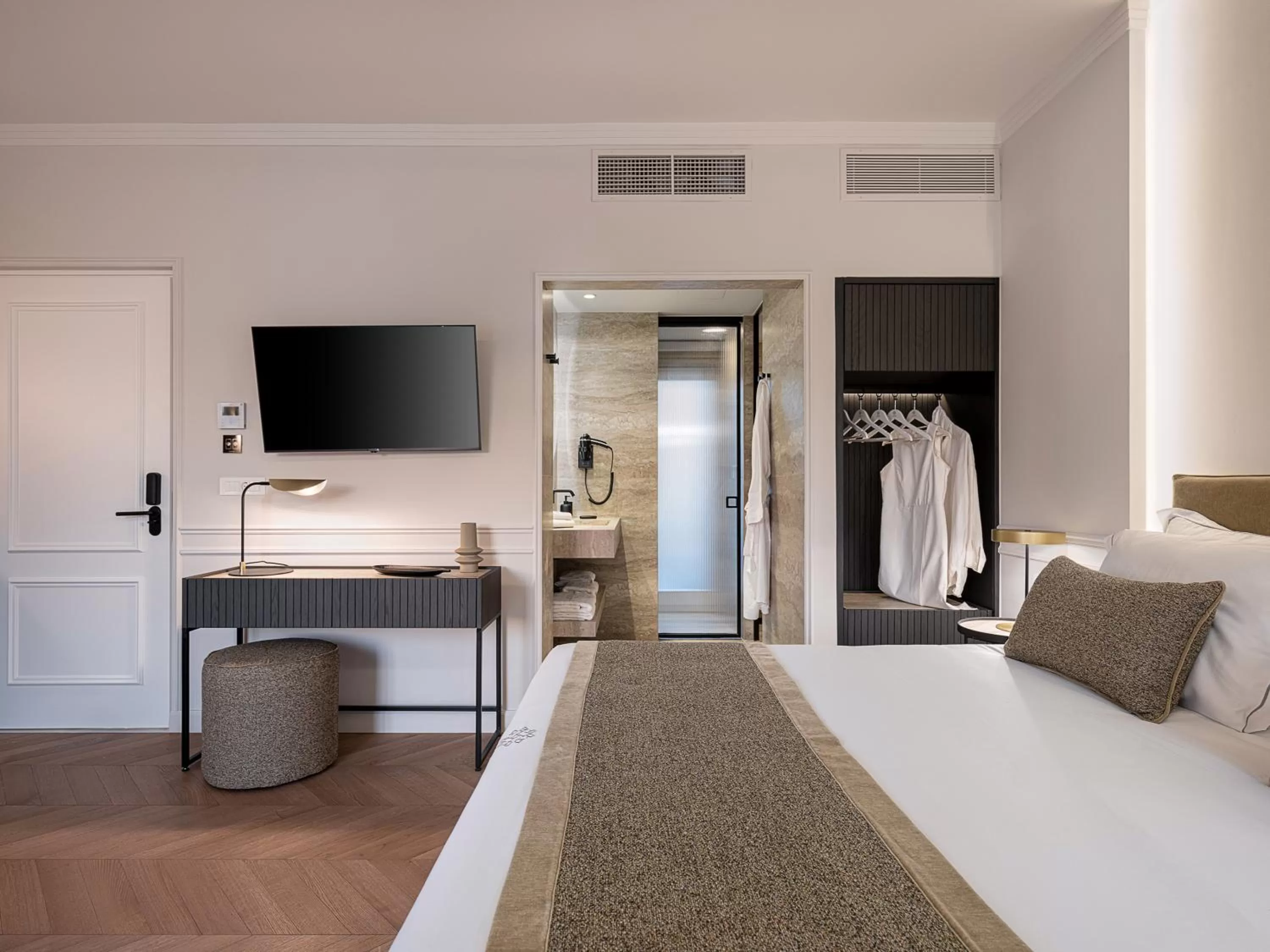 Bed in Riviera Suites