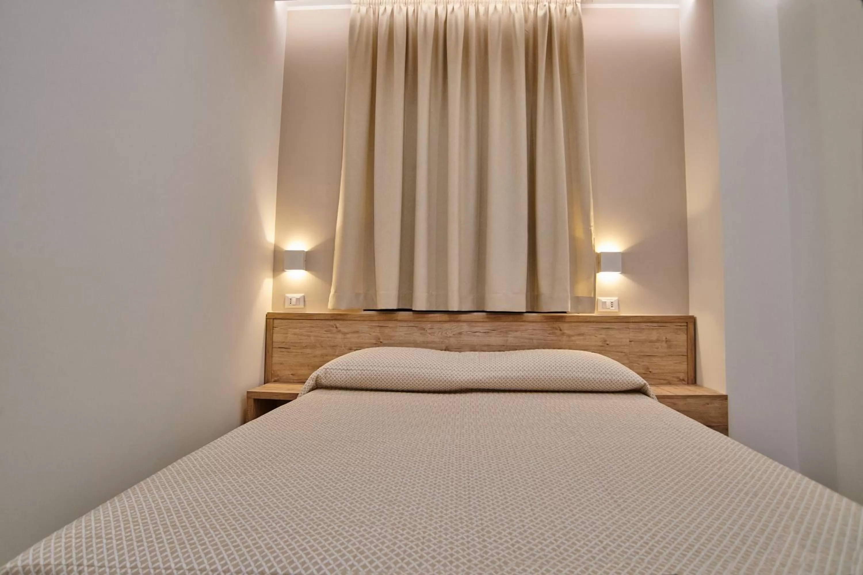 Bed in B&B Giglio di mare