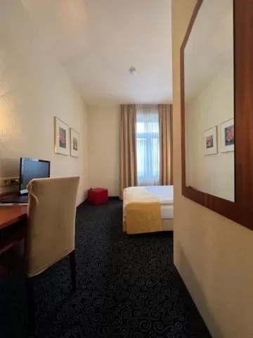 Photo of the whole room in Stadthotel