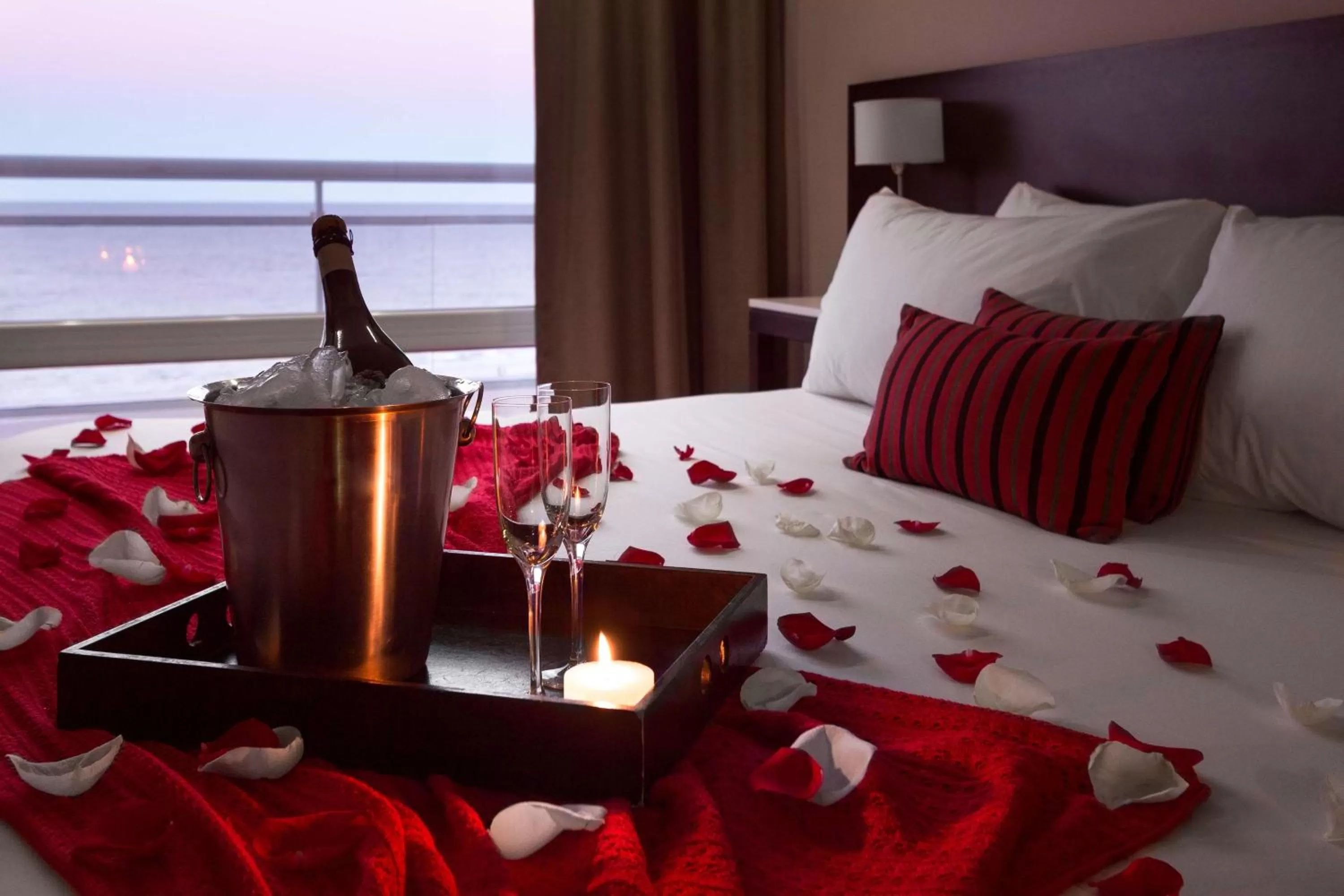 Photo of the whole room, Bed in Dazzler by Wyndham Puerto Madryn