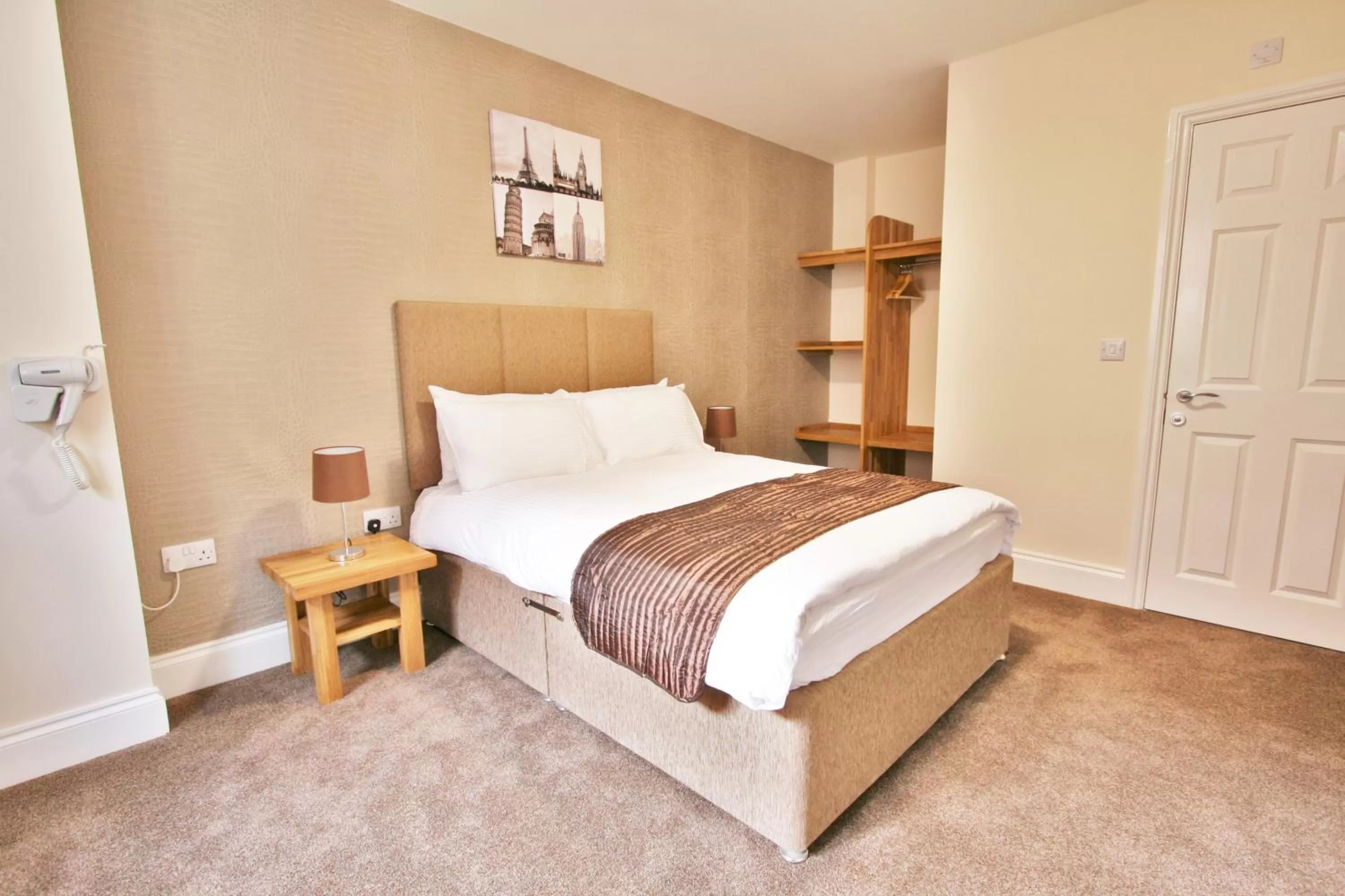Bed in New County Hotel & Serviced Apartments by RoomsBooked