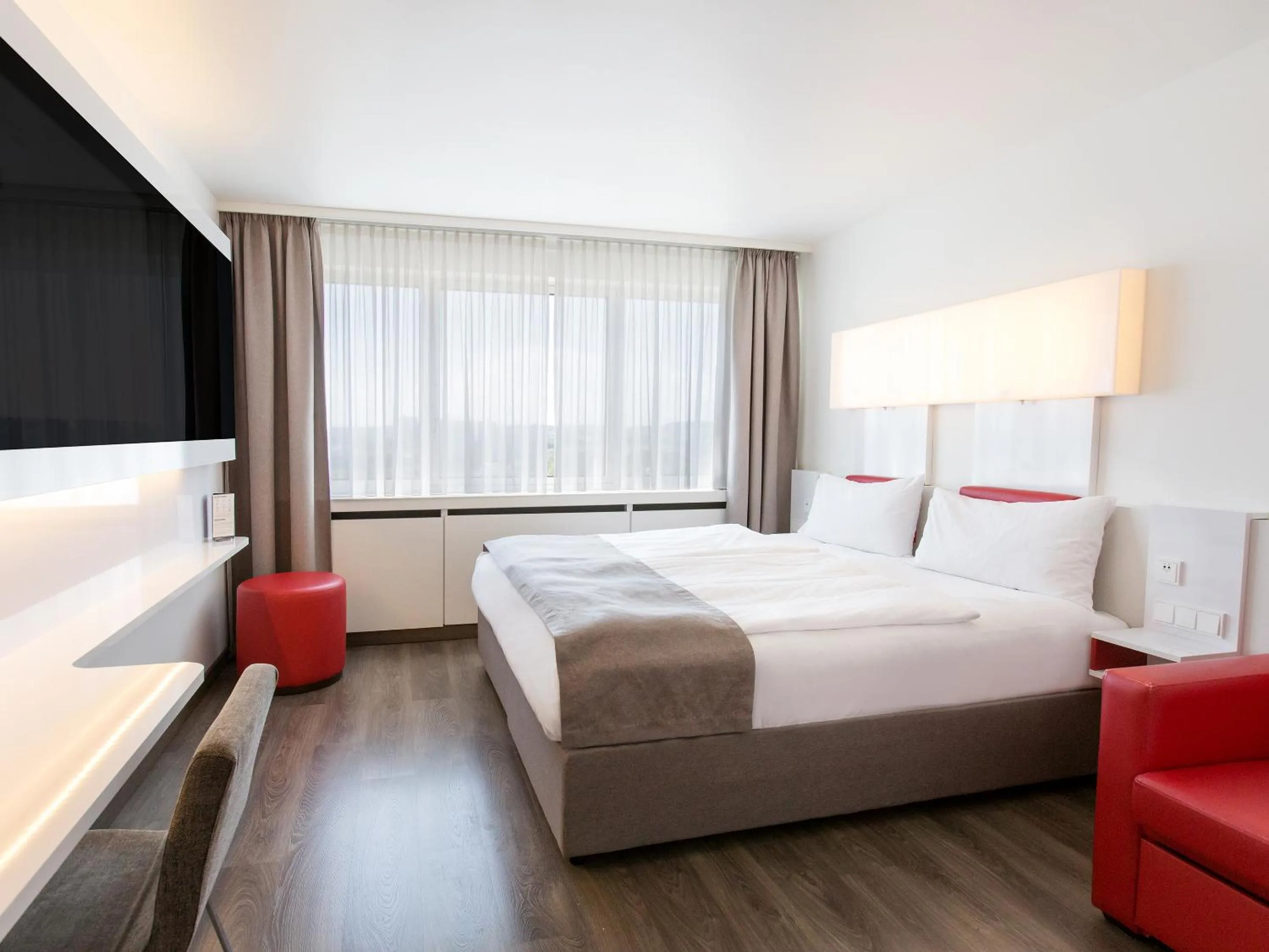 Photo of the whole room, Bed in DORMERO Hotel Stuttgart