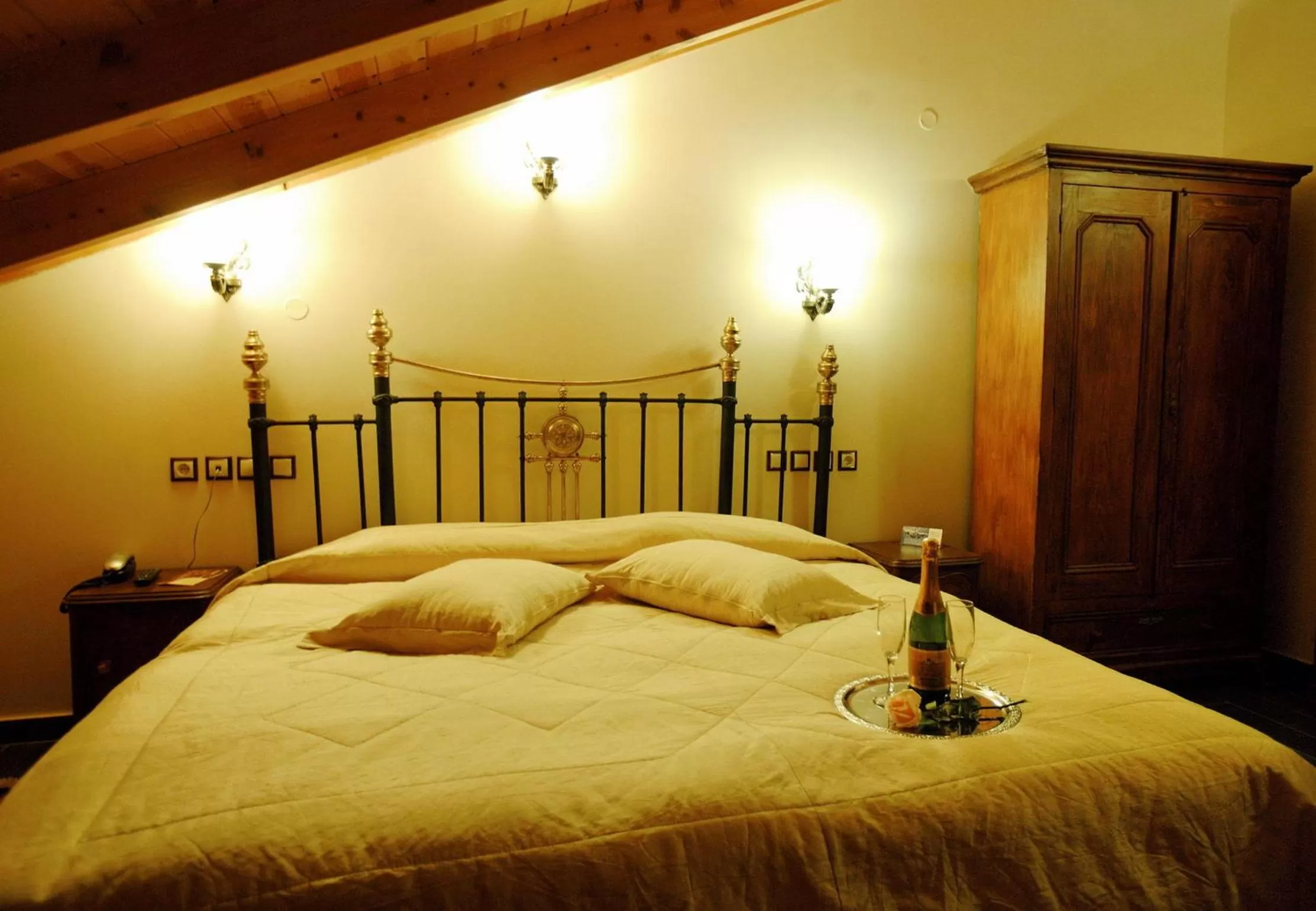 Bed in Theofilos Paradise Boutique Hotel