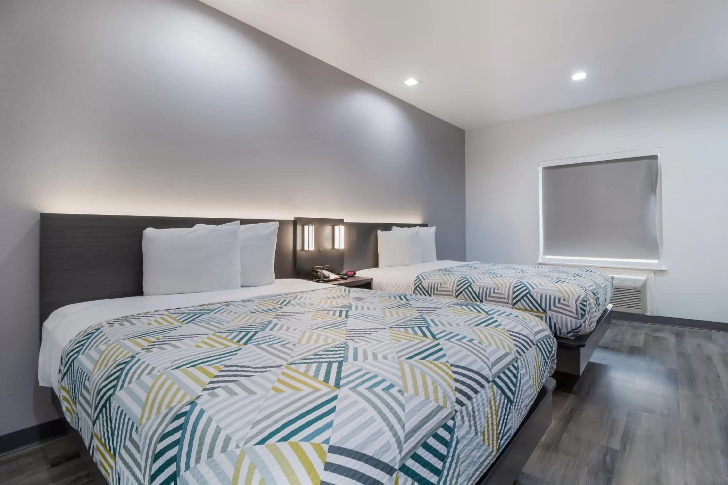 Bed in Studio 6 Katy, Tx