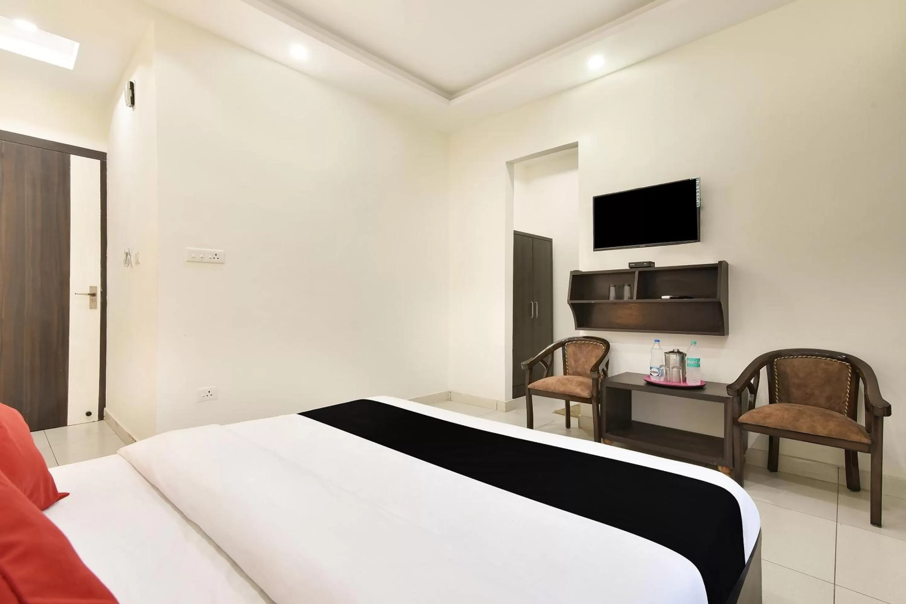 Bedroom, Bed in Capital O Yogasthali Inn Hotel And Spa