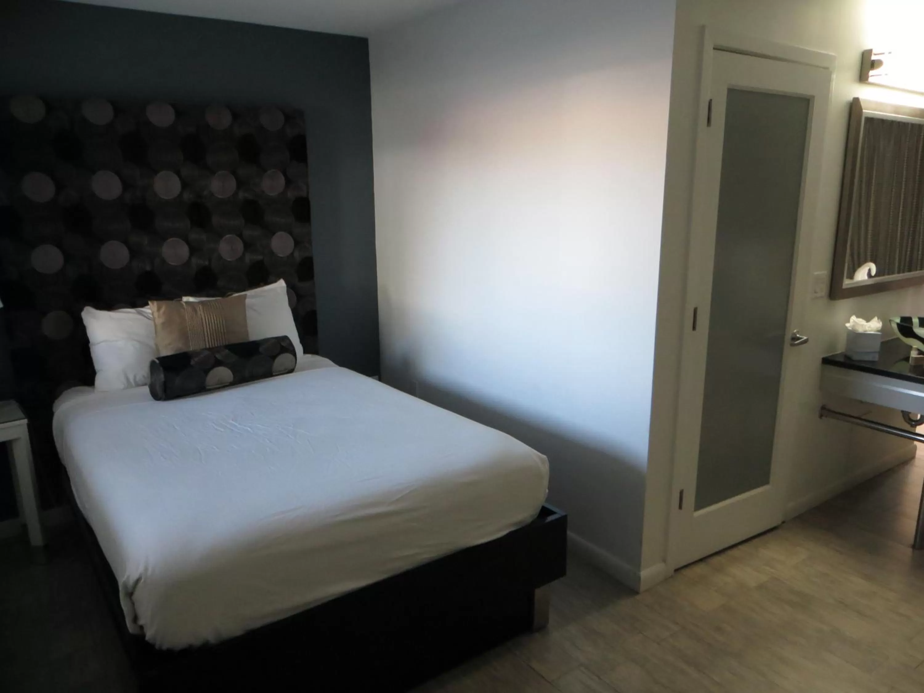 Bed in Lotus Boutique Inn and Suites