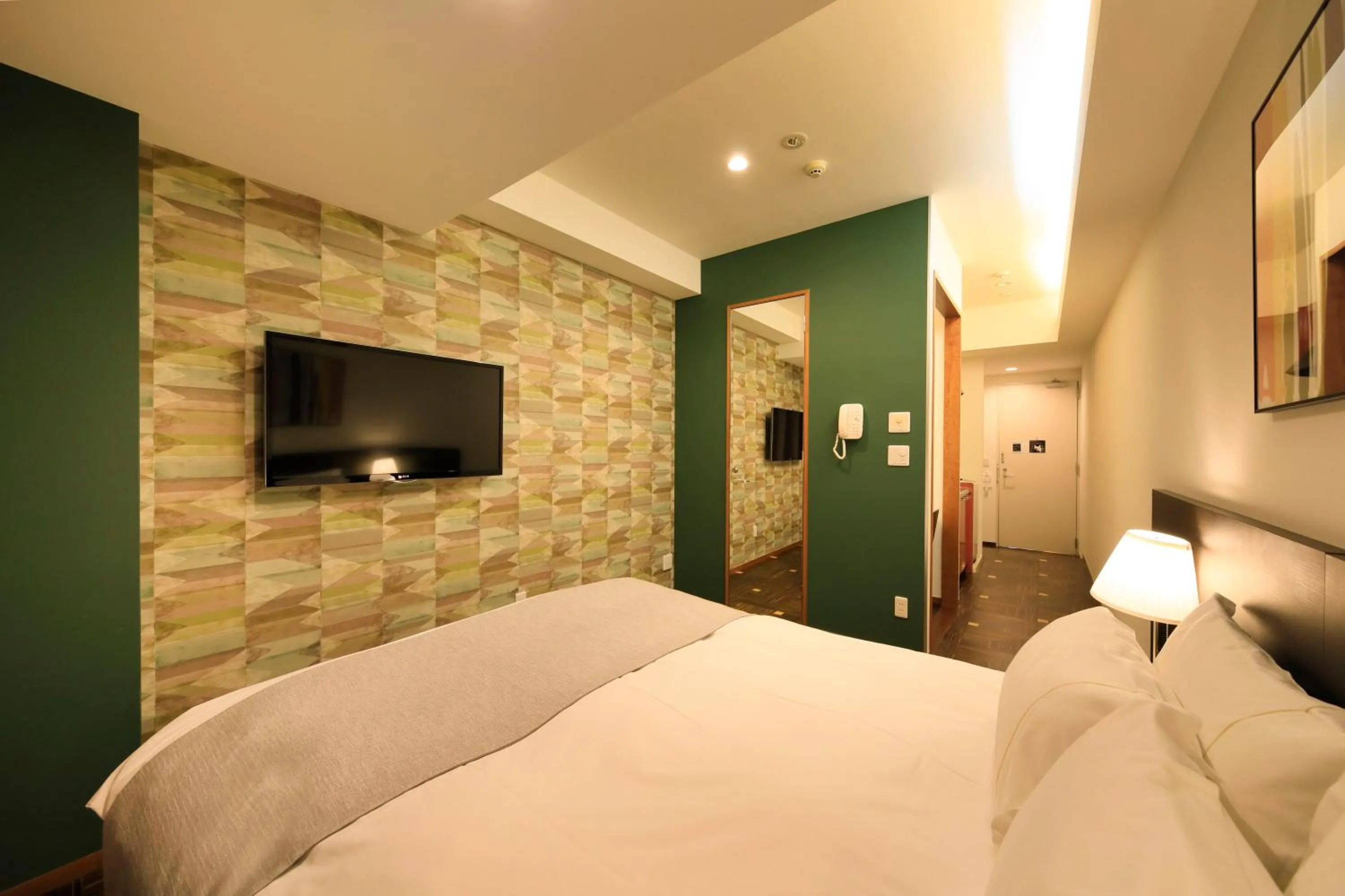 Photo of the whole room, Bed in Centurion Hotel Residential Akasaka Station
