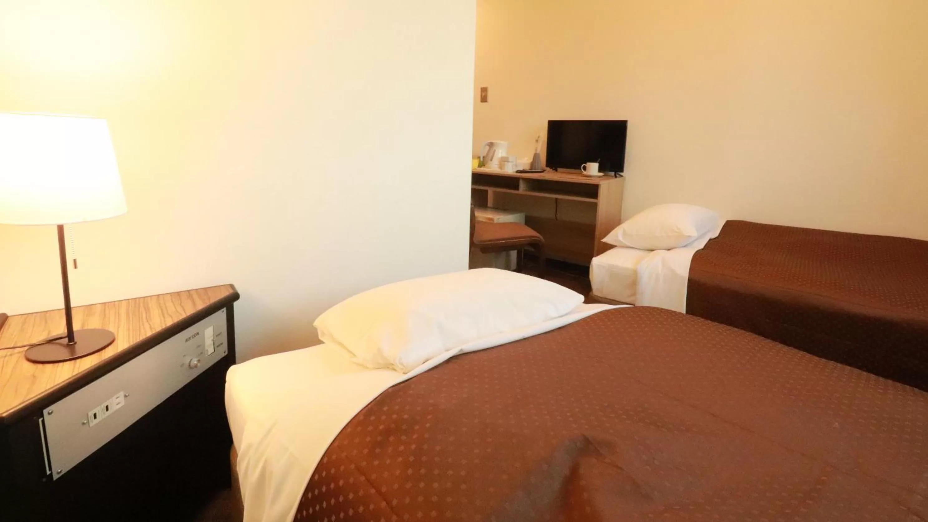 Photo of the whole room, Bed in Business Hotel Kudamatsu
