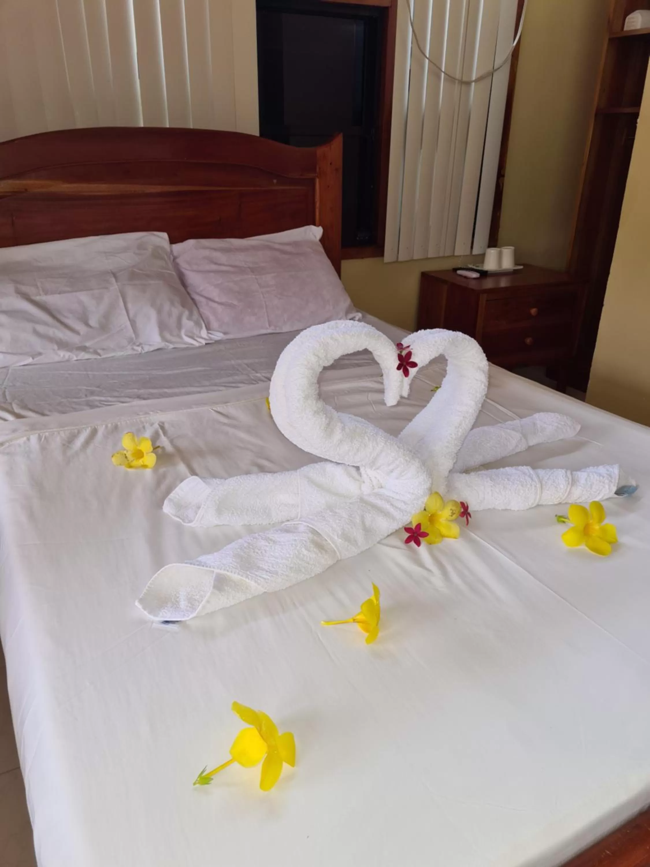 Bed in La-Familia Guest House