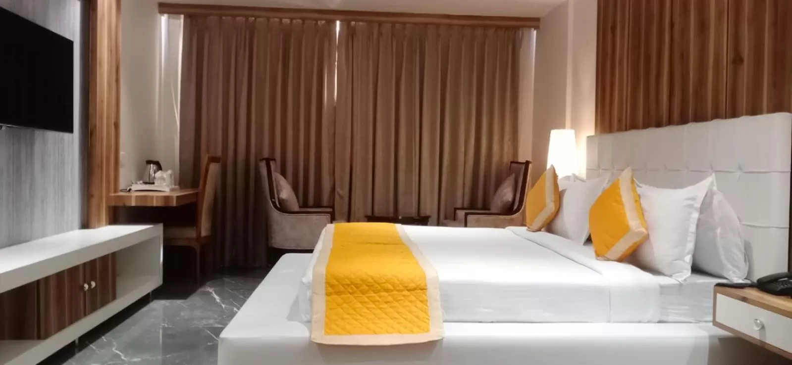Bed in Dhamma Grand Hotel Resort