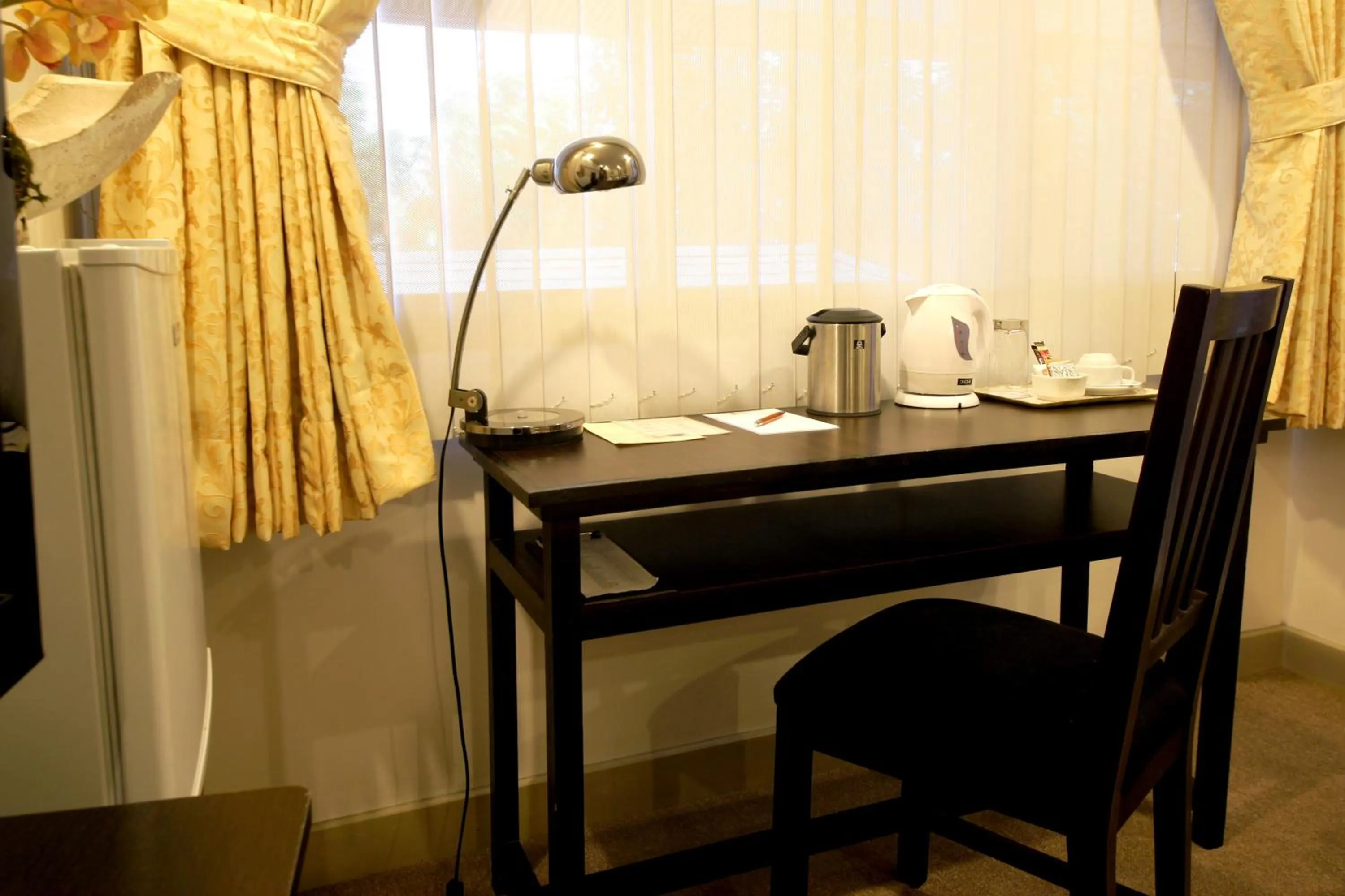 Coffee/tea facilities, Bathroom in Casa Pura Inn and Suites