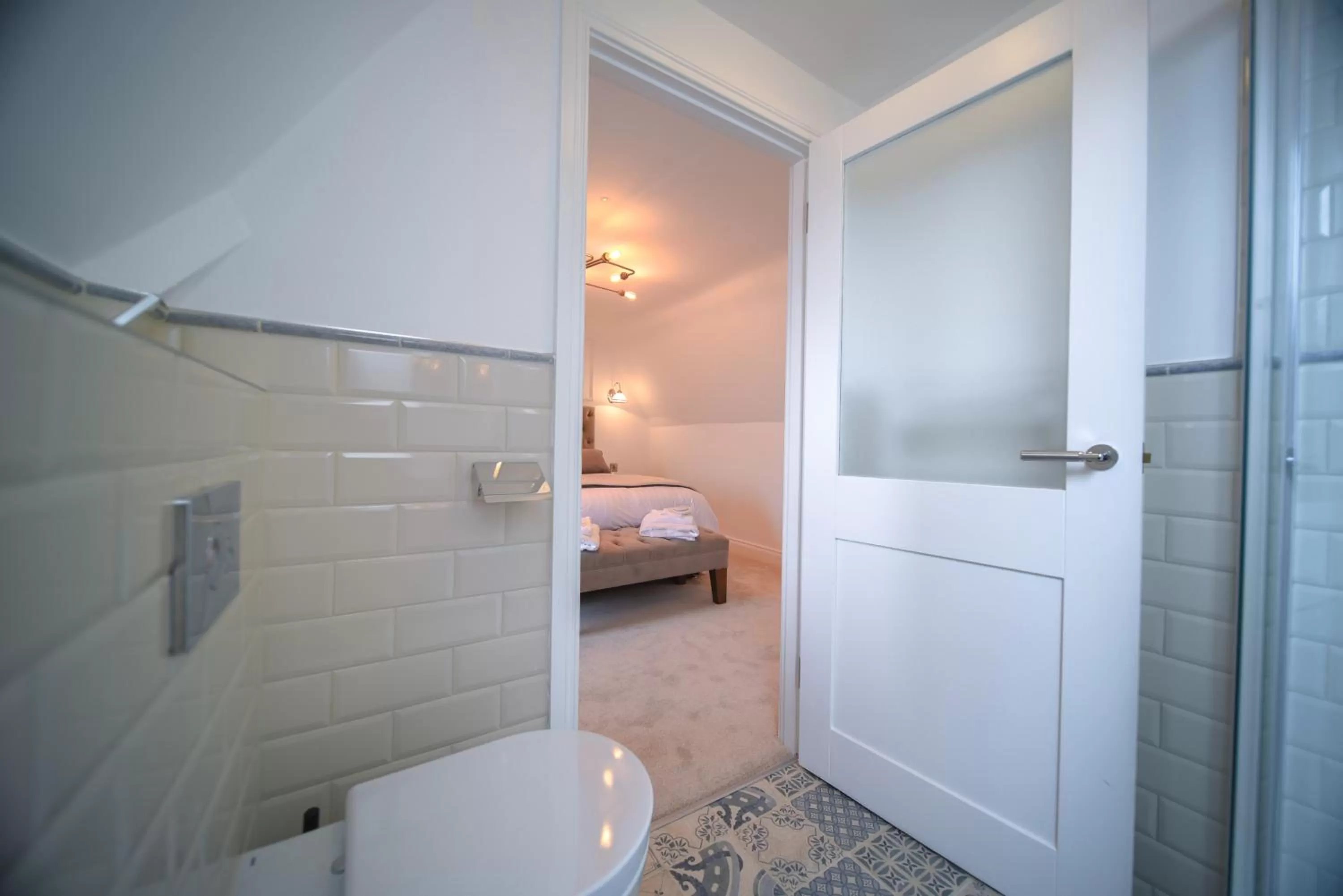 Toilet, Bed in The Strand Hotel, the former residence of Oscar Wilde