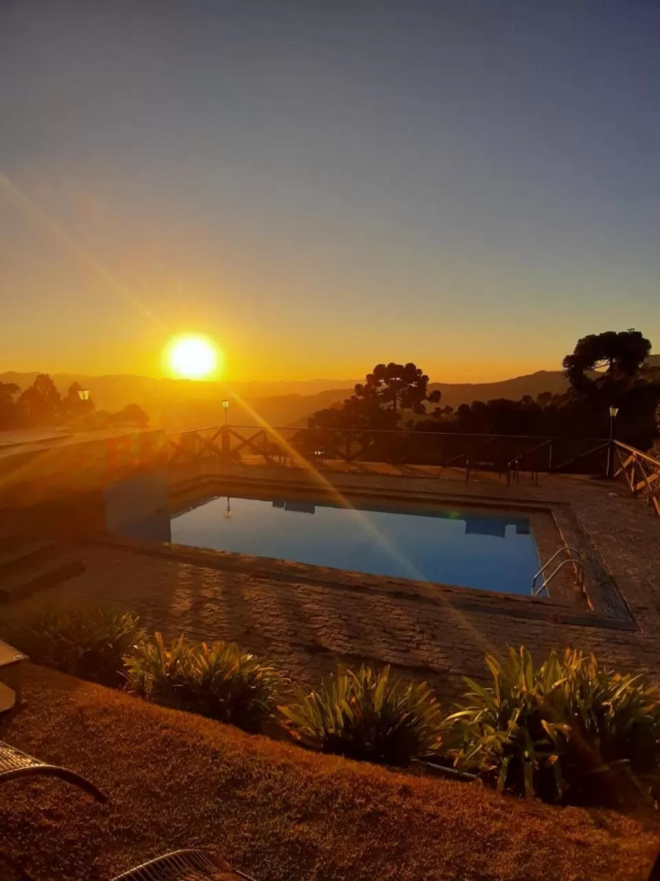 Swimming pool in Pousada Village Por do Sol by Concavus