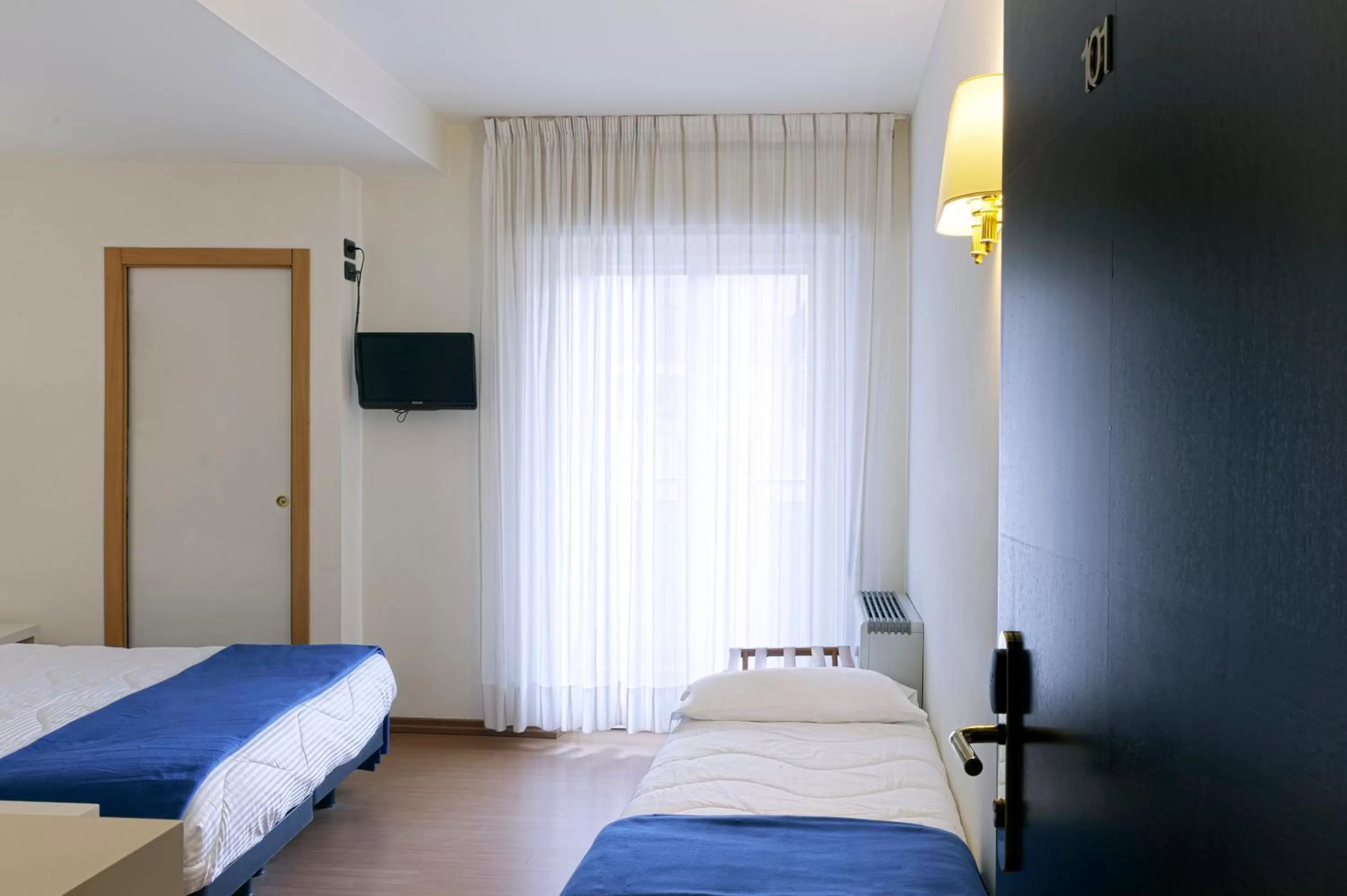 Photo of the whole room, Bed in Hotel International