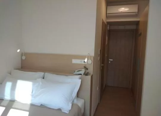 Bed in Gallery Suites & Residences Piraeus