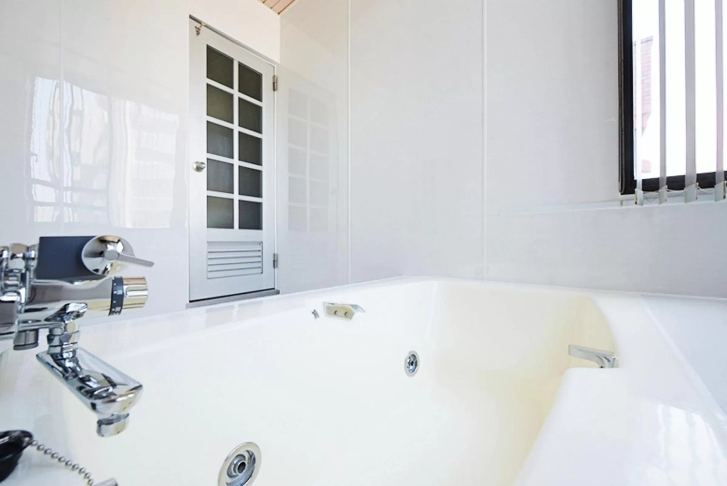 Bathroom in Hostel PLEASURE MARUYAMA