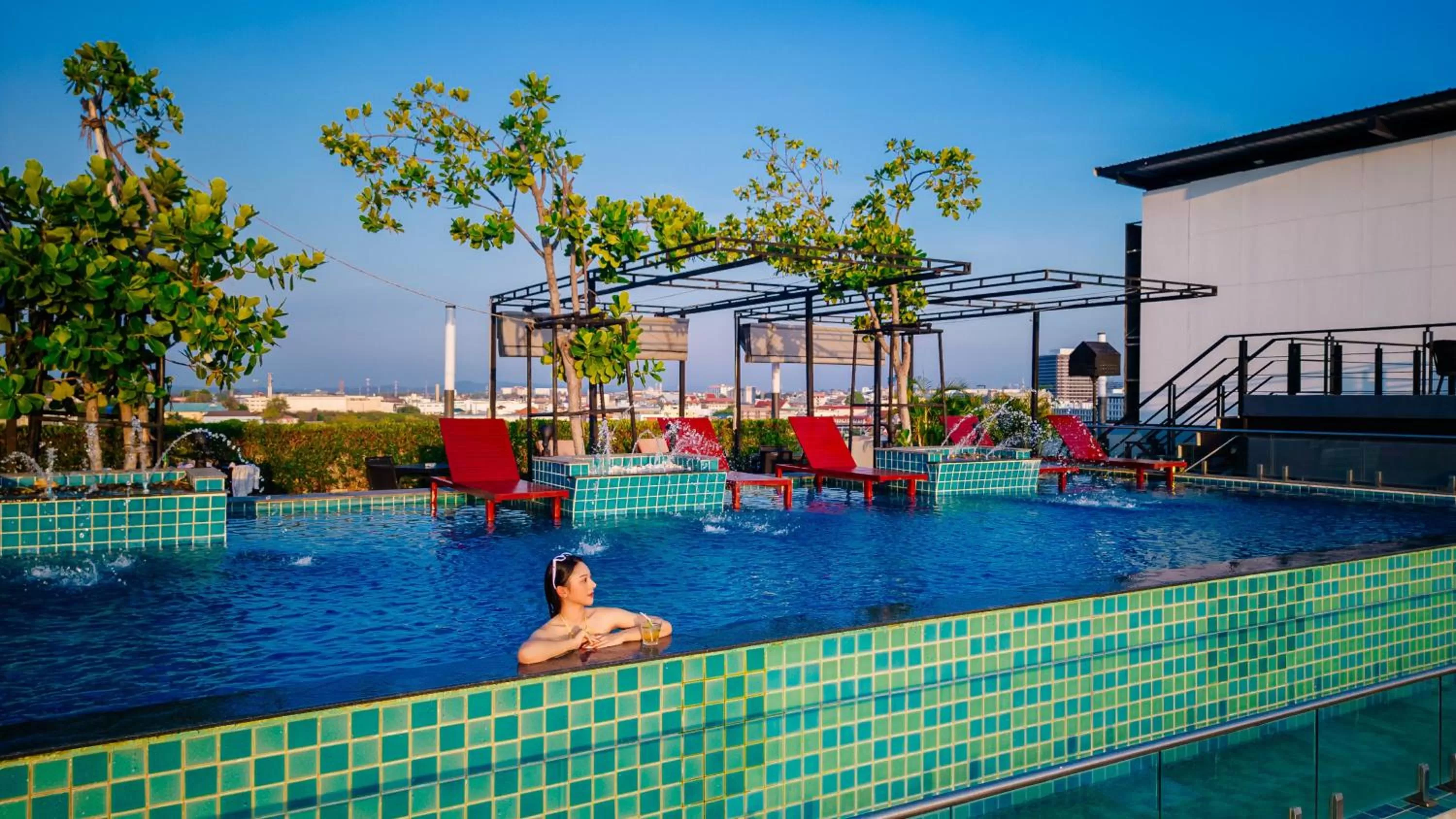Swimming pool in SureStay Plus by Best Western T Pattaya