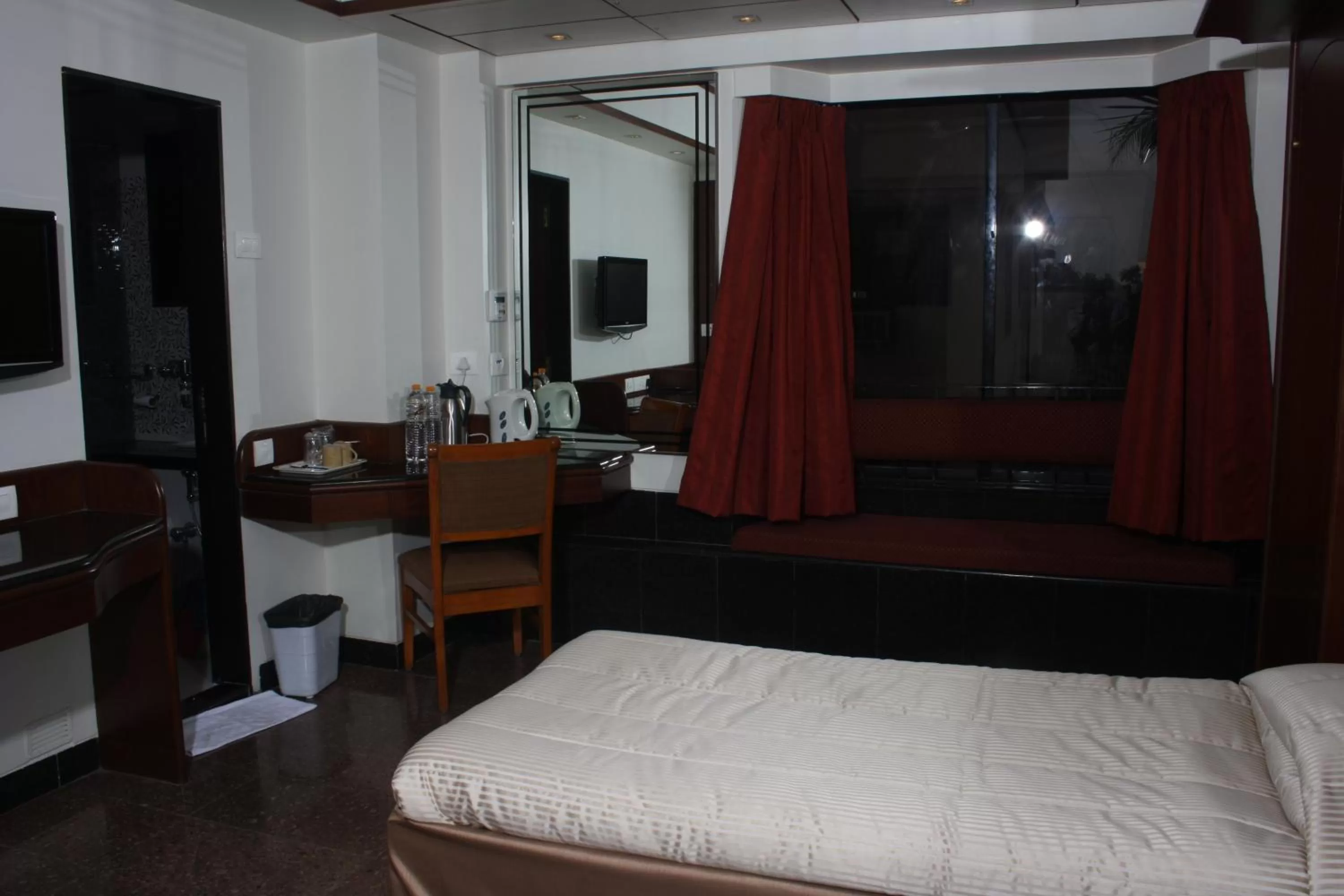 Photo of the whole room, Bed in Hotel Karl Residency