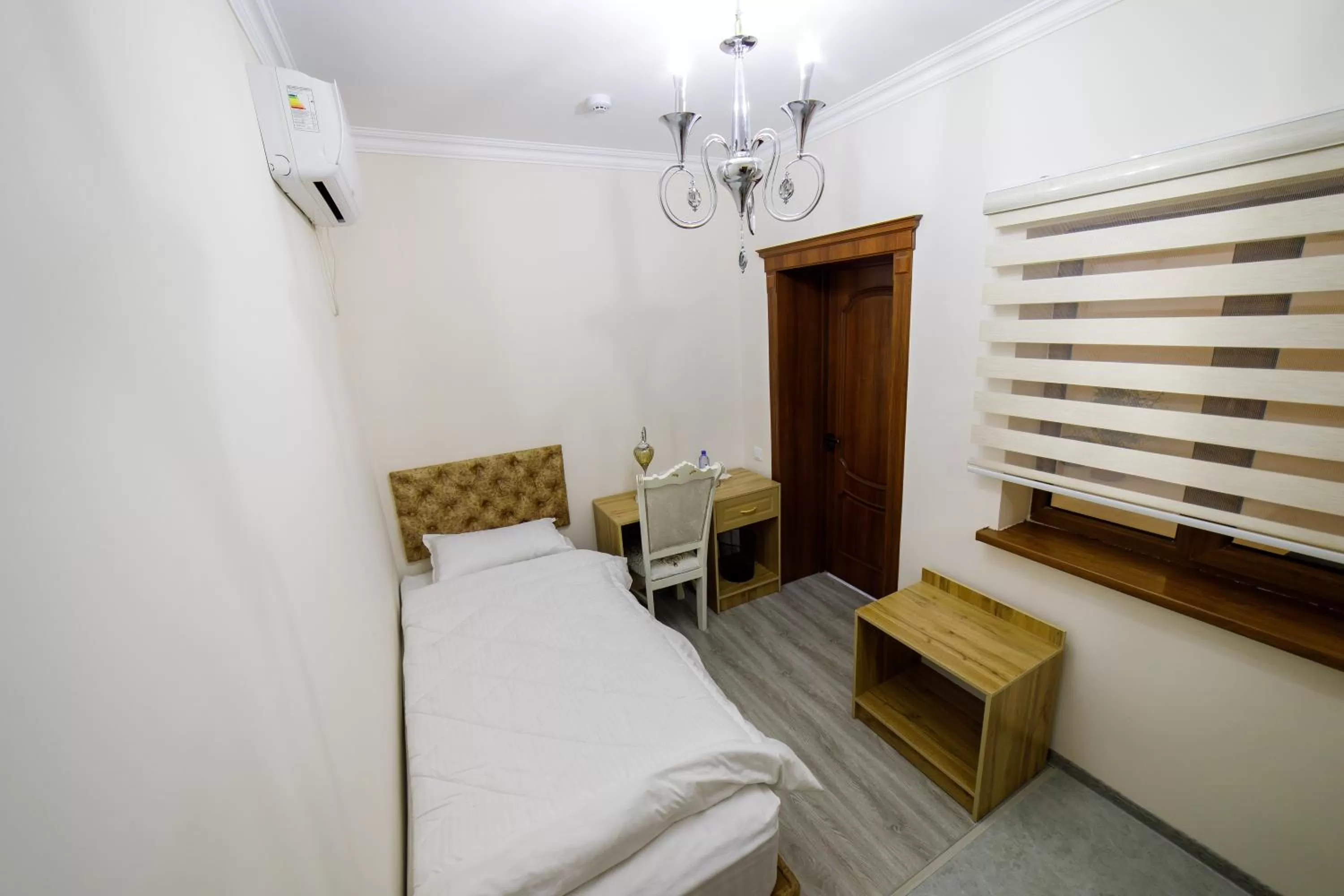 Bed in Khans Palace Hotel