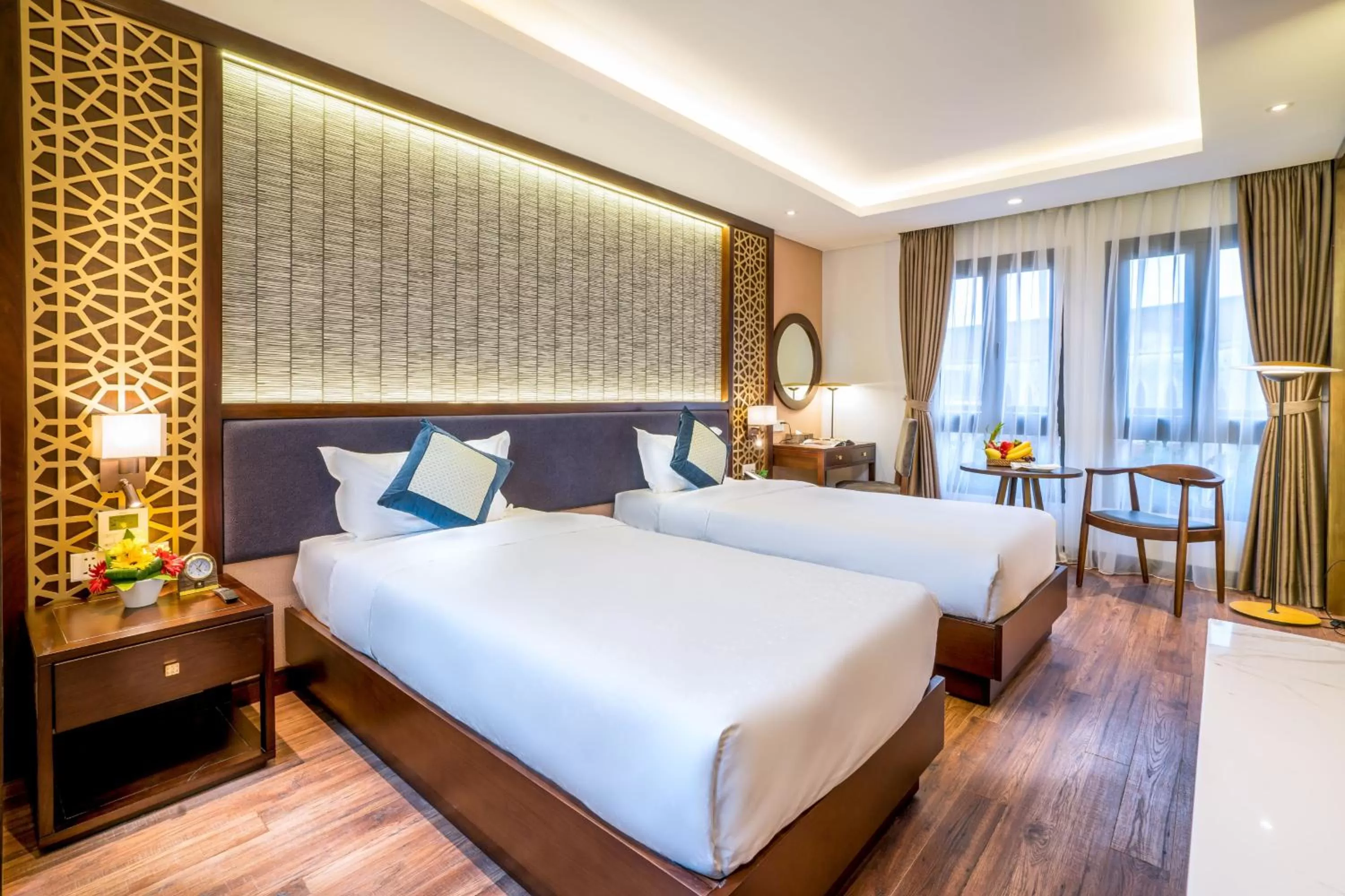 Bed in Conifer Grand Hotel