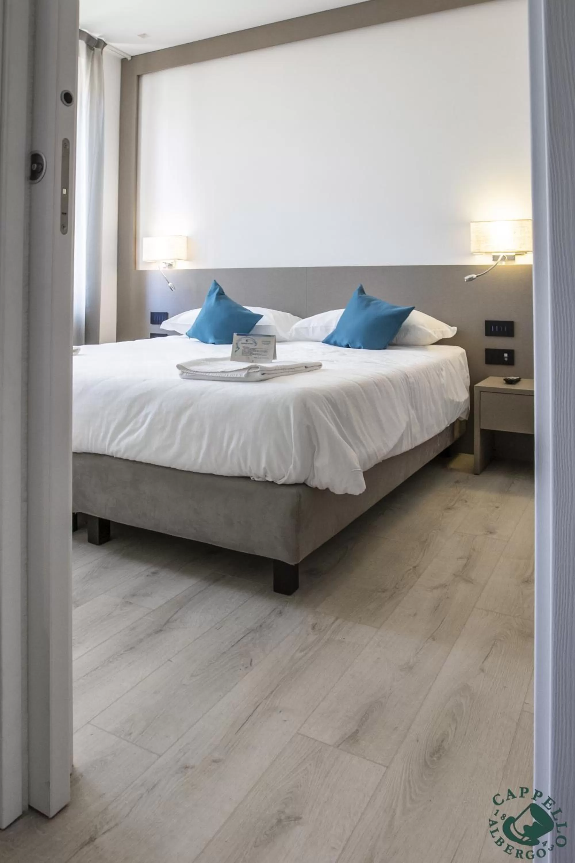 Bed in Albergo Cappello e Cadore