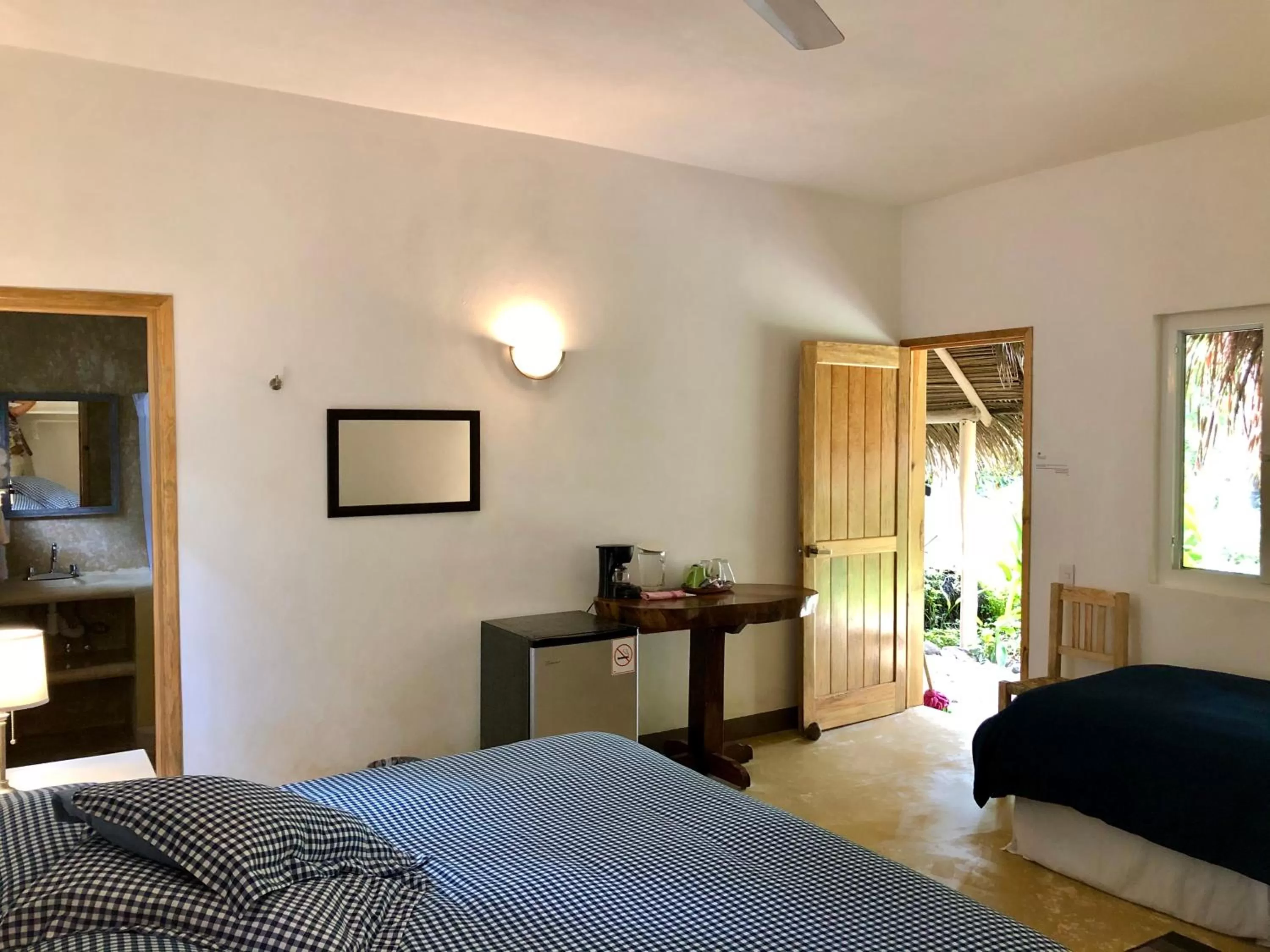 Bed in Junto al Rio Bungalows & Suites