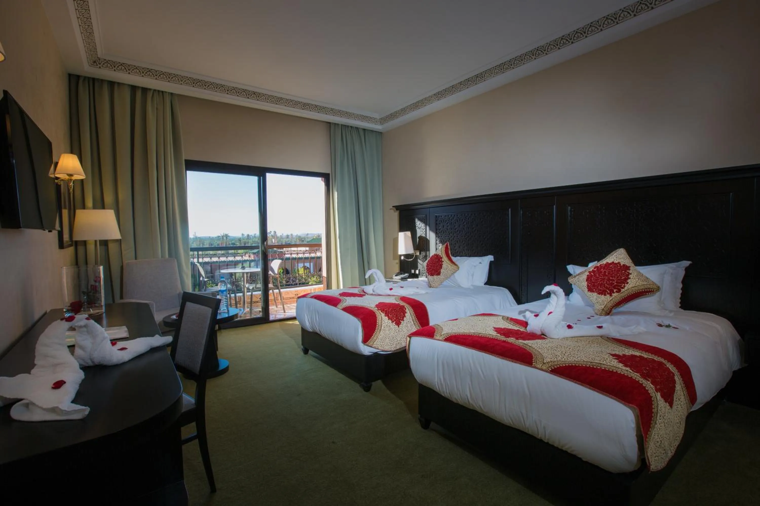 Photo of the whole room, Bed in Ennakhil Marrakech Hotel & SPA