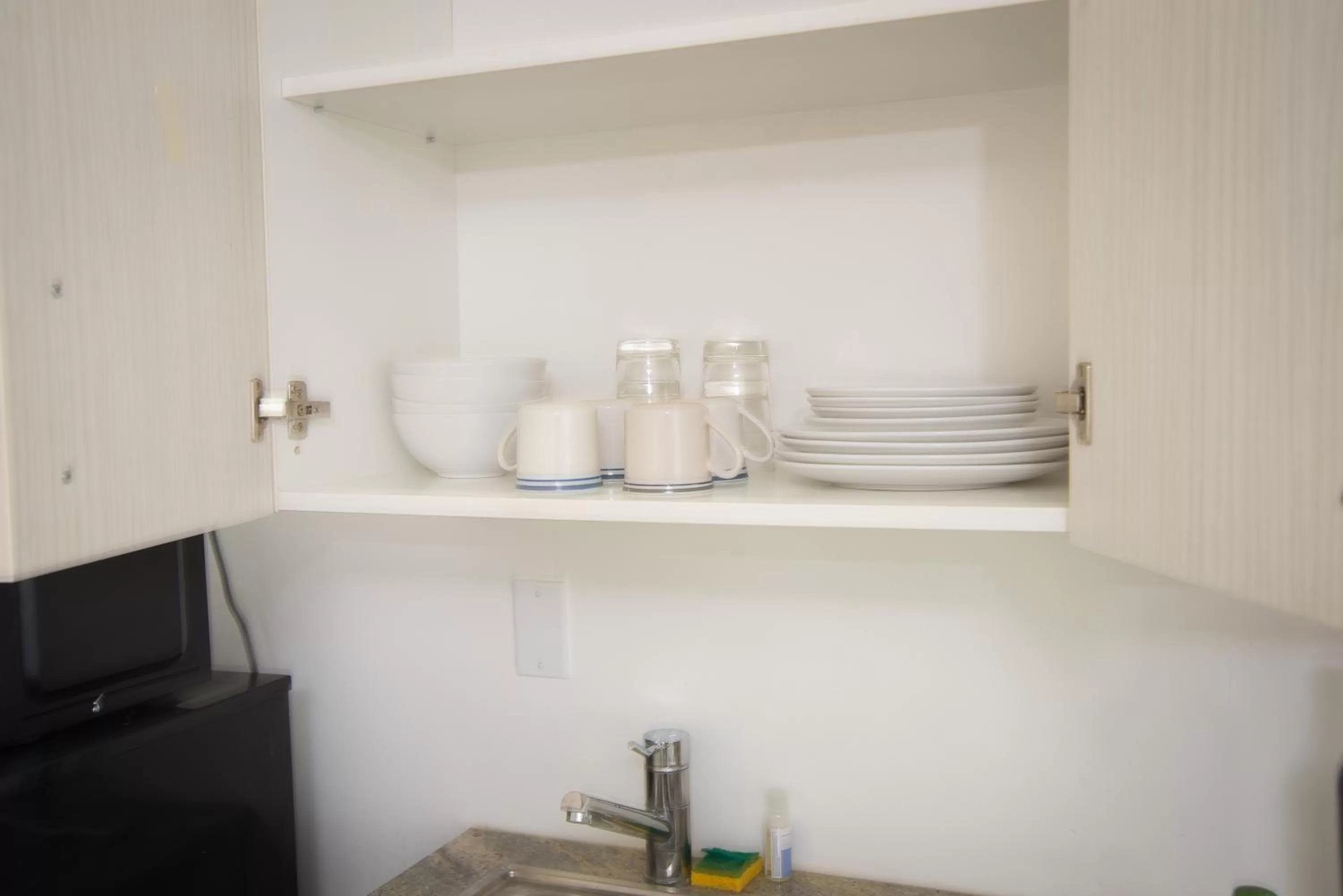Kitchen or kitchenette in Regency Inn & Suites Sarasota