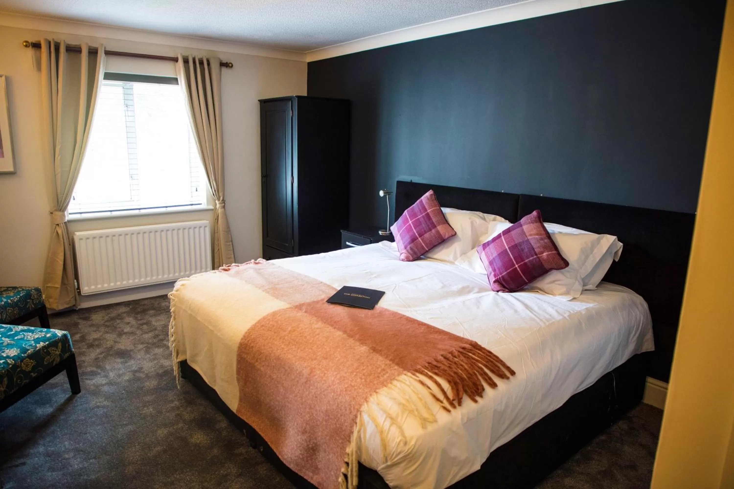 Bed in The Charlton Boutique Hotel