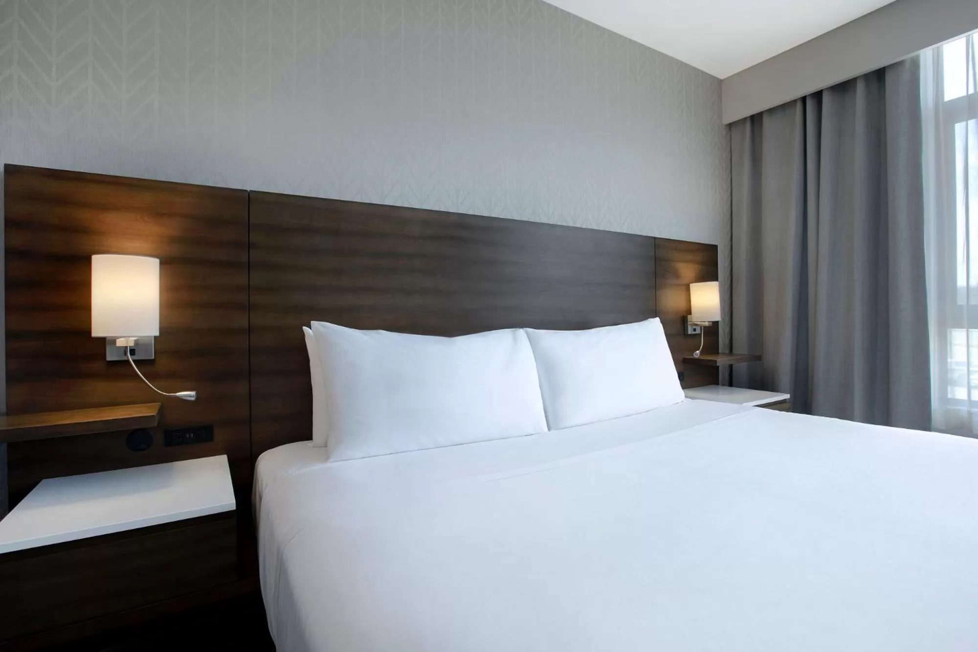 Bed in Great Blue Heron Hotel