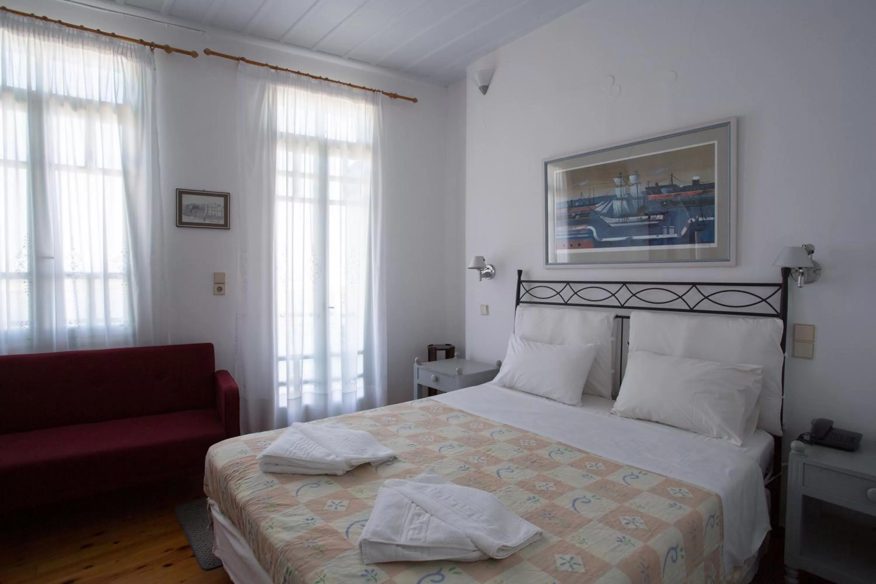 Bed in Nostos Hotel