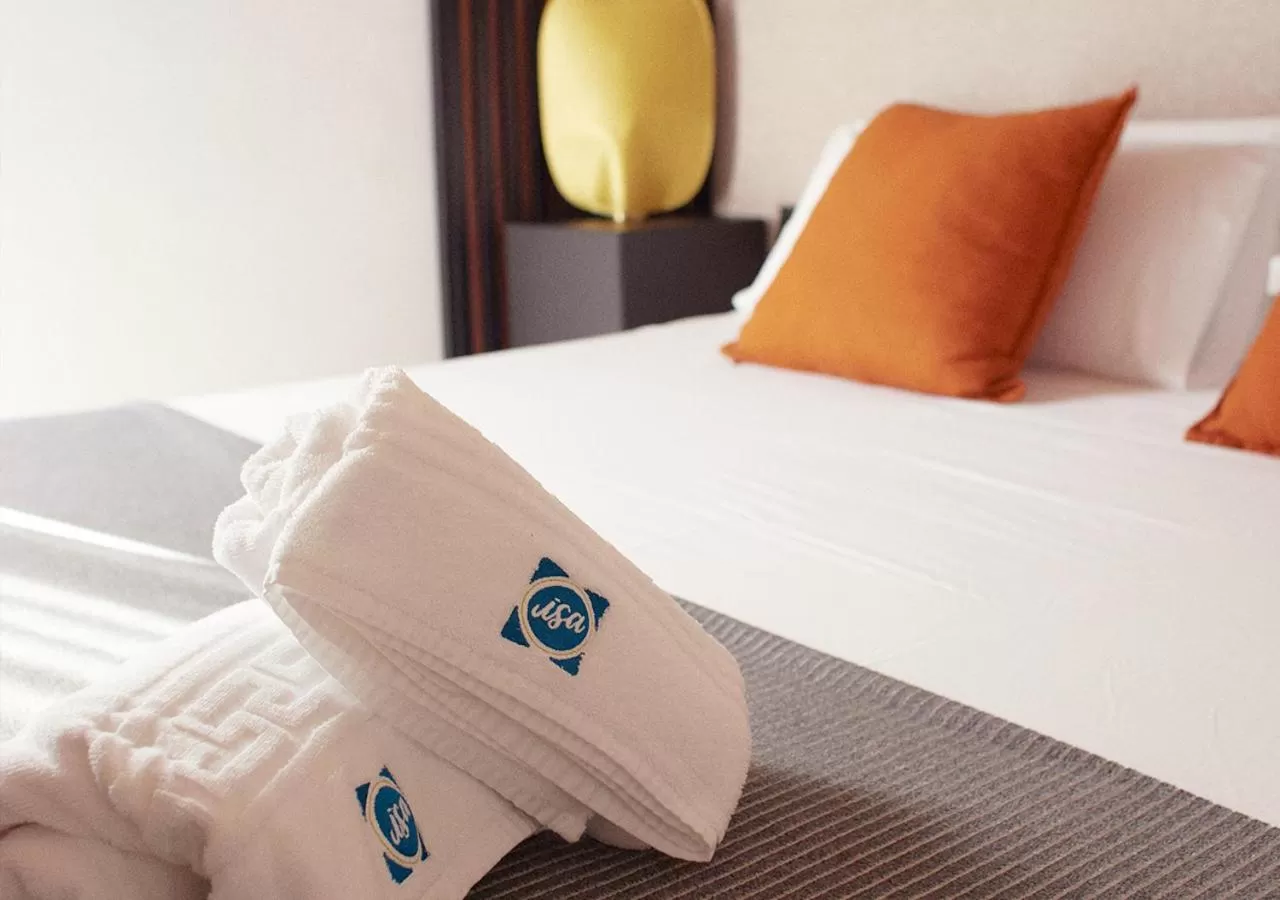 Bed in ISA Sevilla Suites