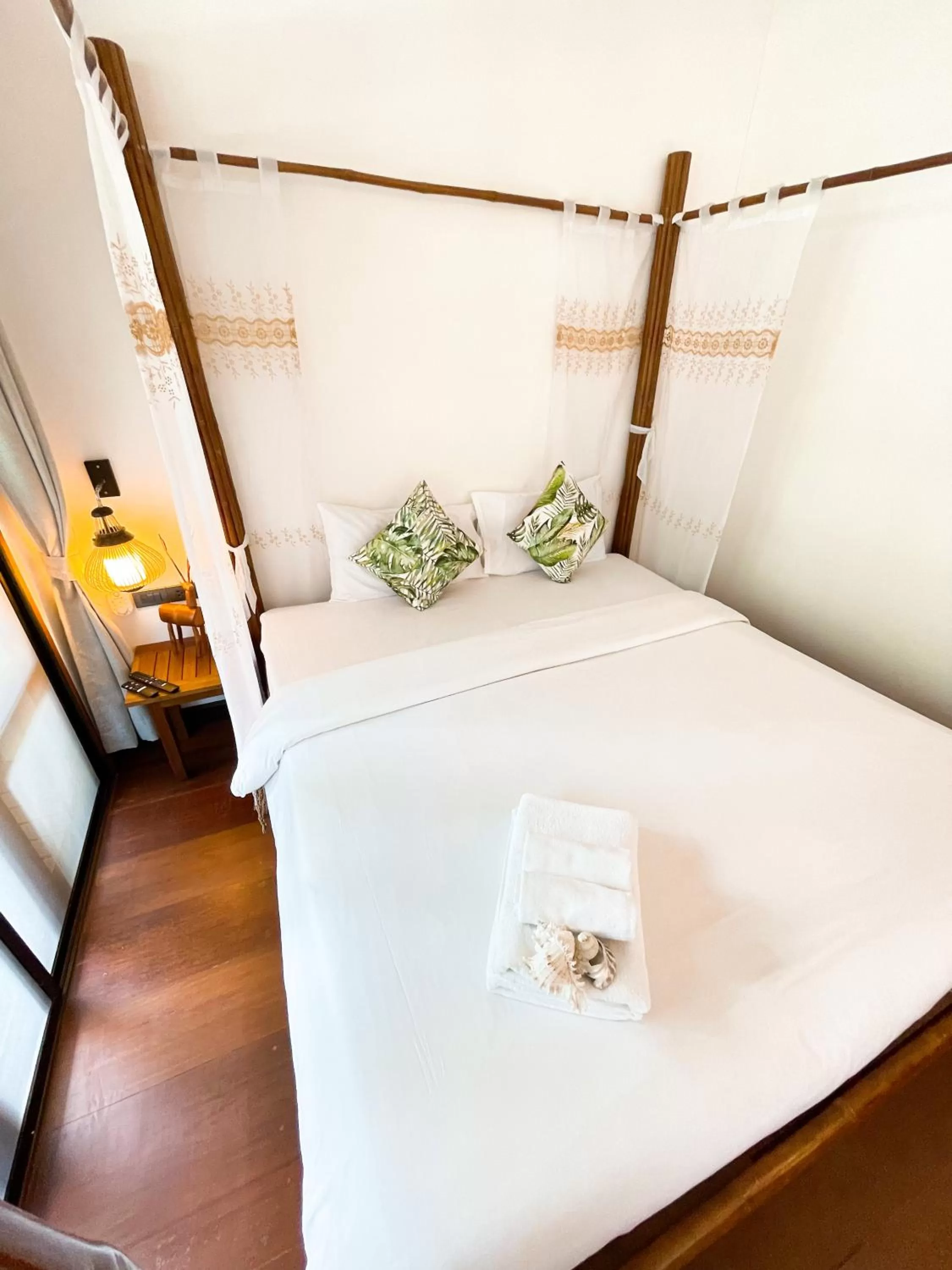 Bed in À La Koh Kood Resort