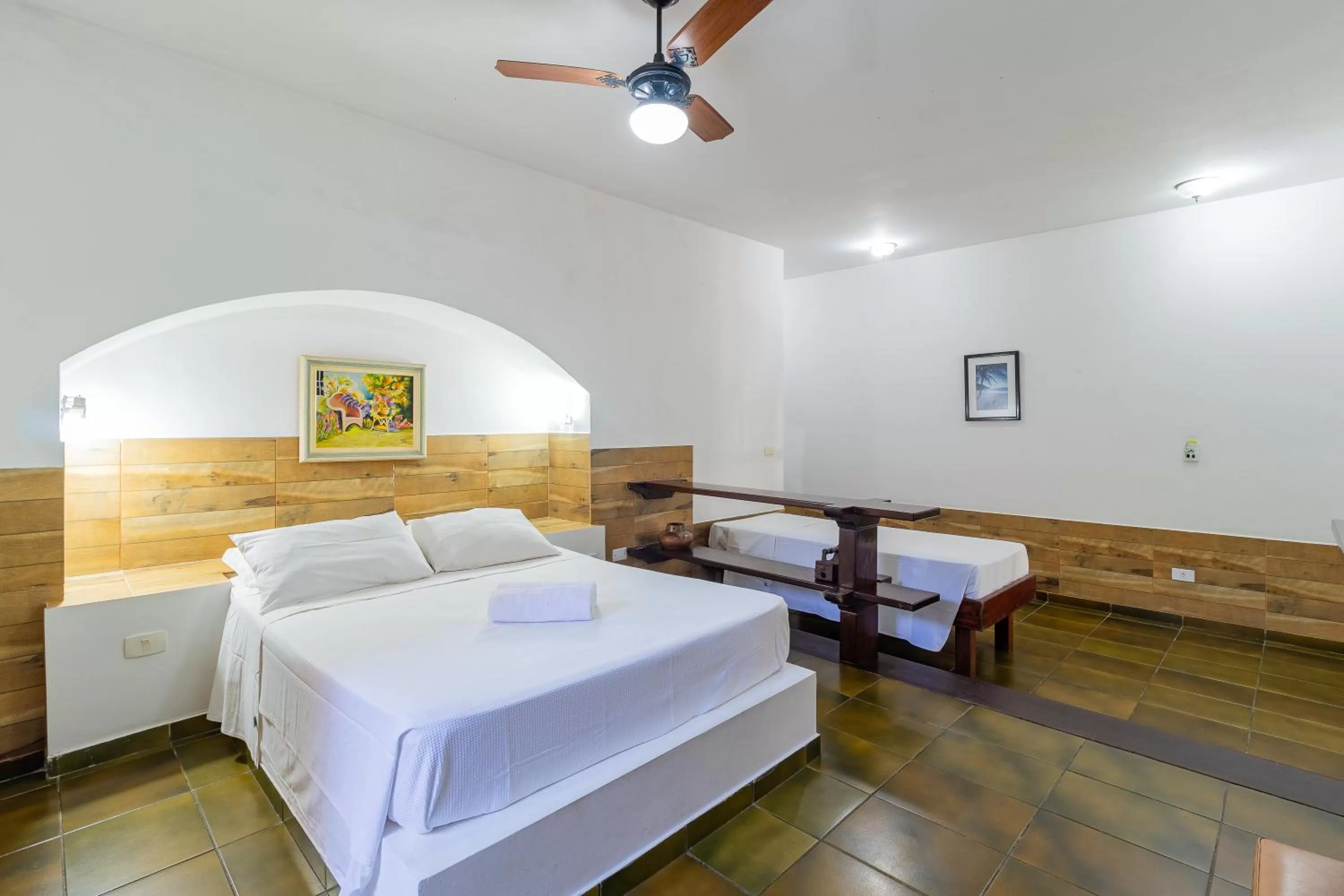 Bed in Pousada Casa Amarela